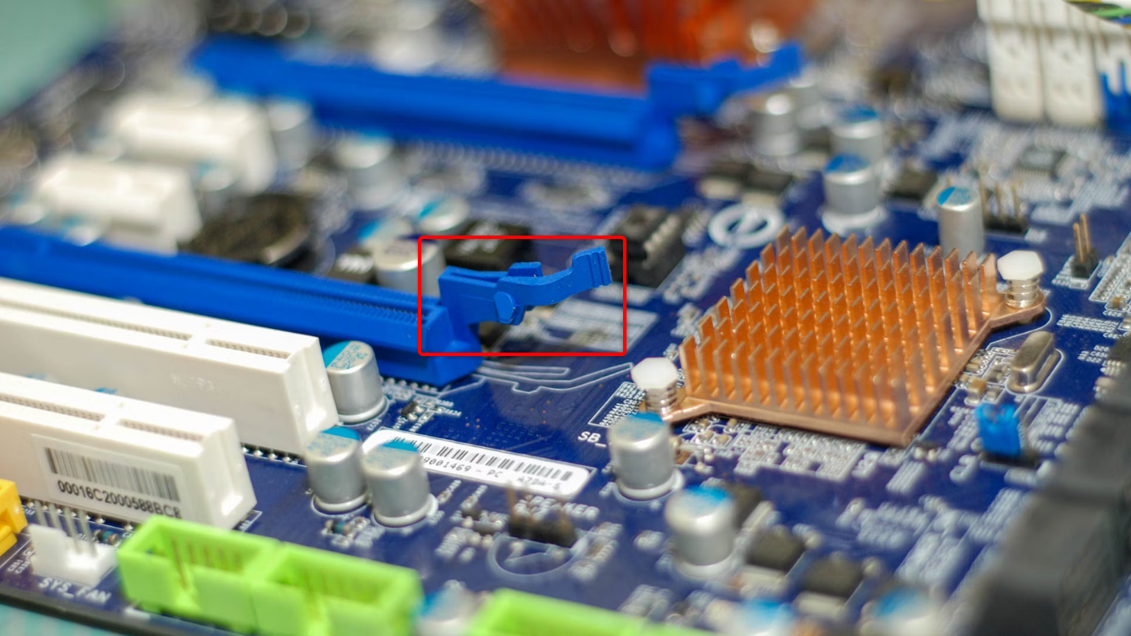 PCIe slots, PCI slots, and other electrical parts in a motherboard.