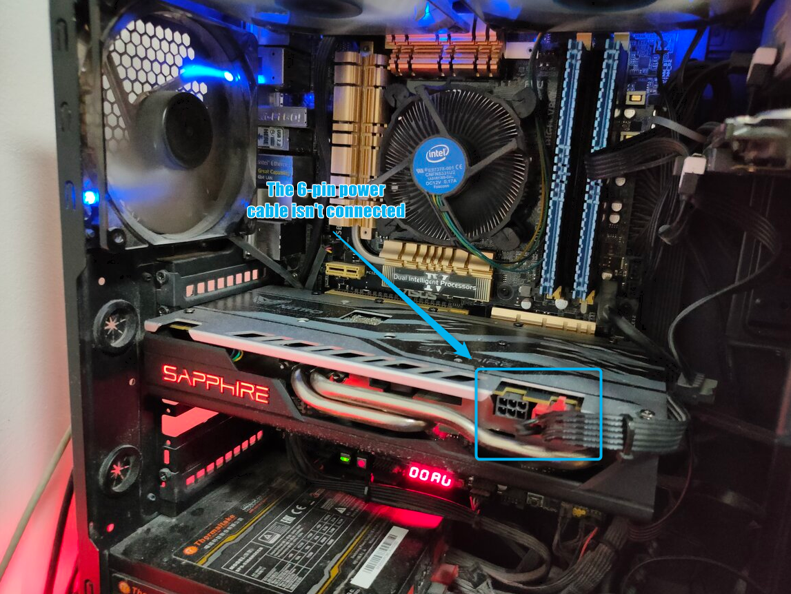 A graphics card inside a computer iwth a missing 6-pin power supply cable.