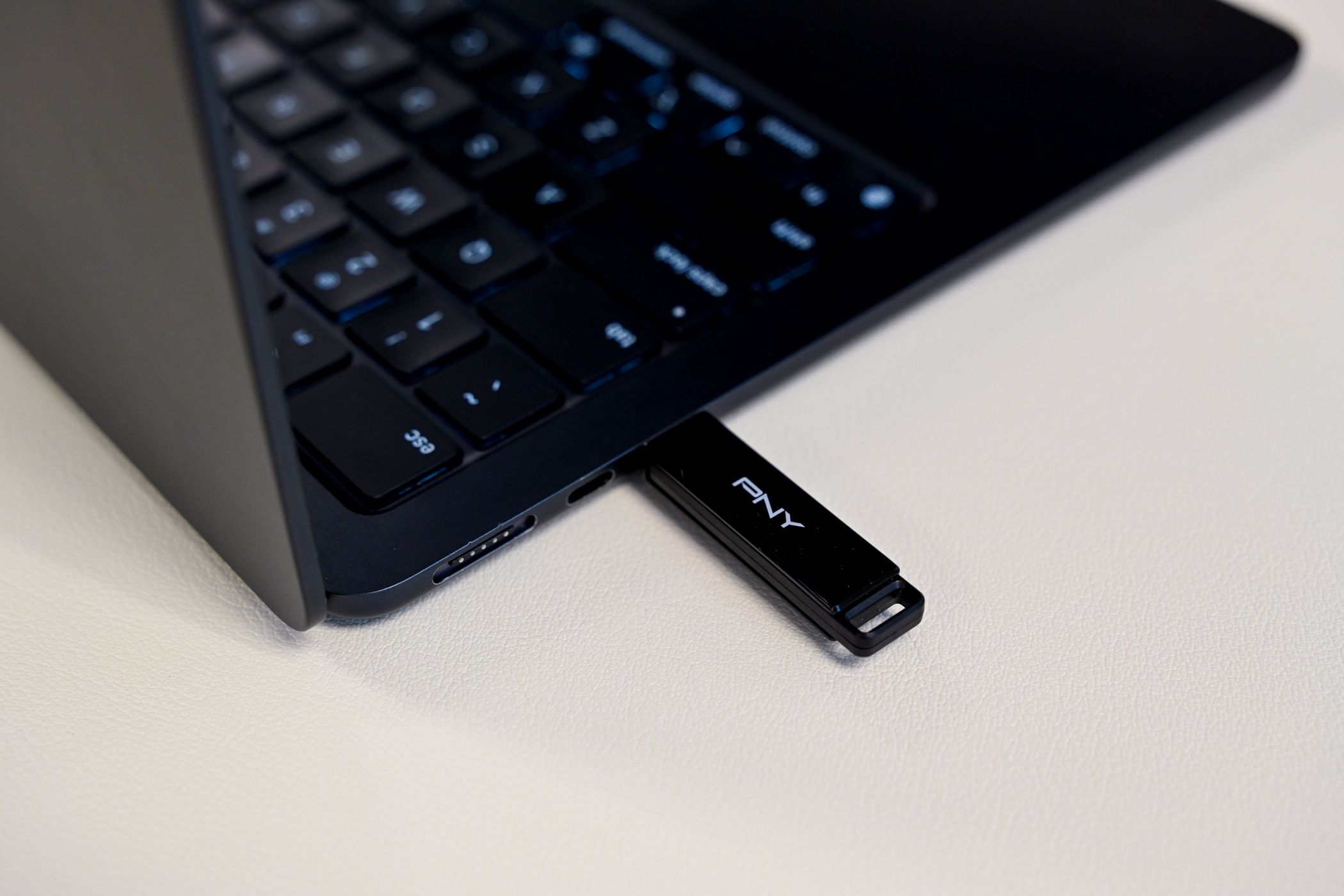 The PNY Elite X Type C flash drive plugged into a laptop.