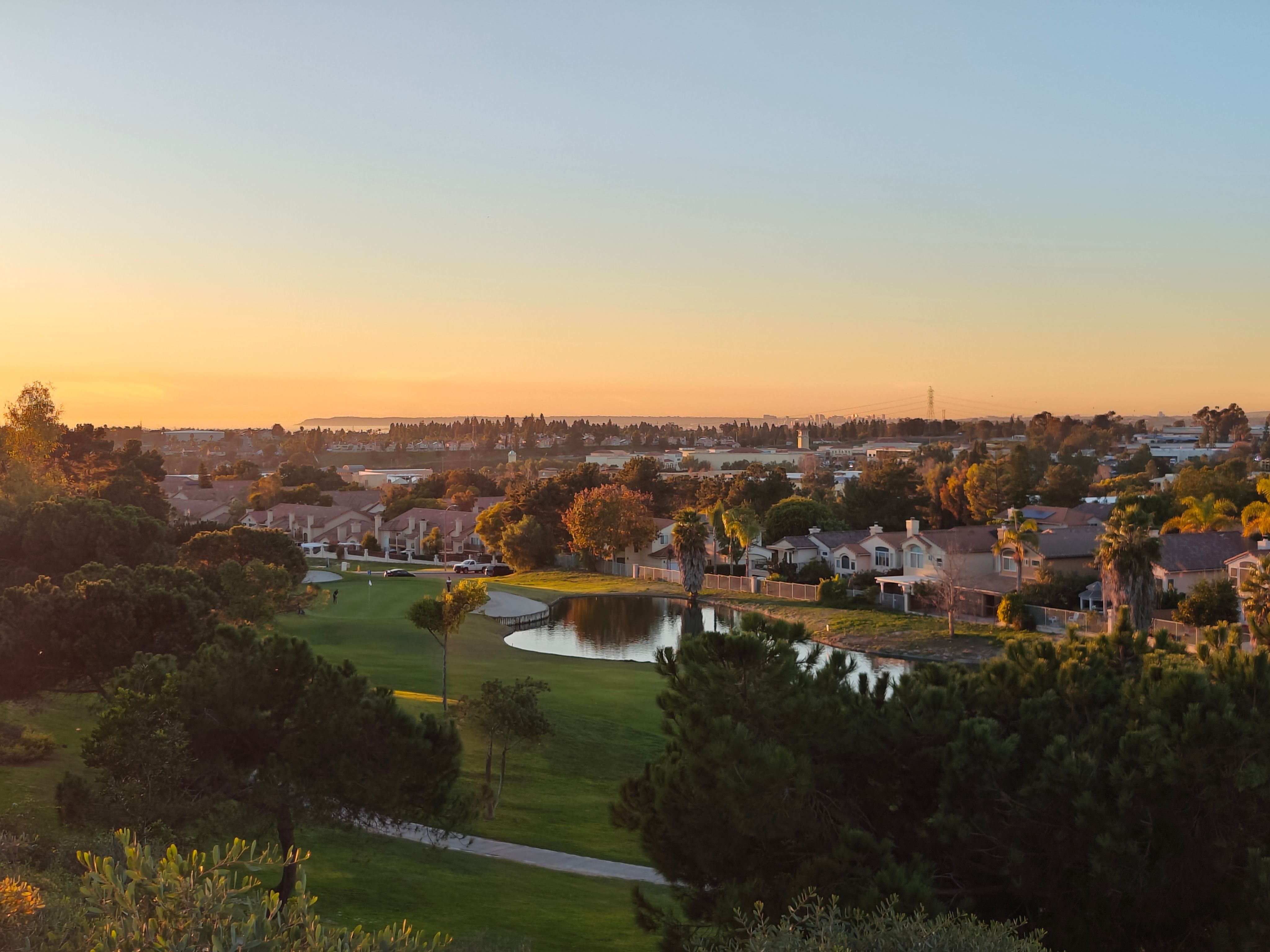 Photo of a sunset of over a town taken with the OnePlus12-2x.