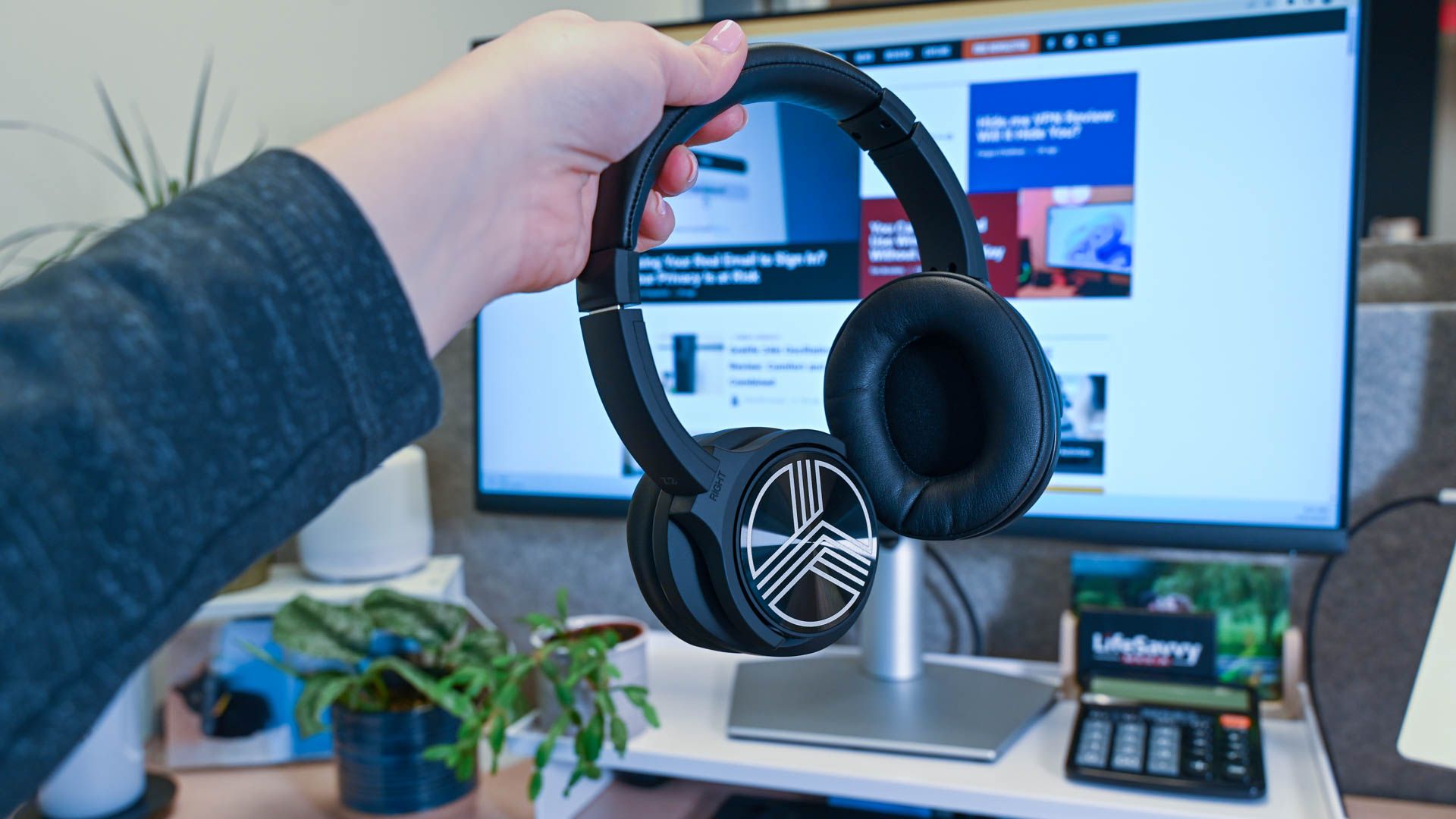 Person holding the Treblab Wireless HD Headphones z2