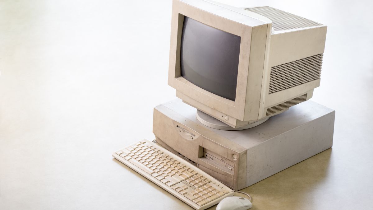 A vintage computer setup with grungy, stained look.