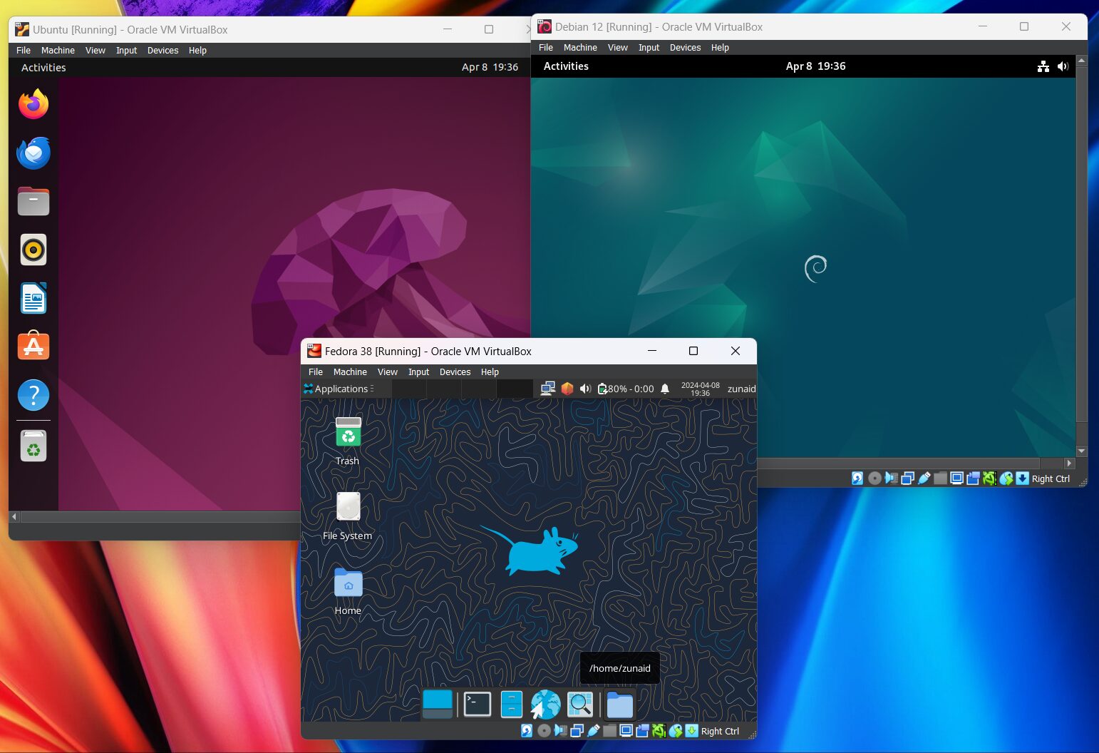 An example of Ubuntu, Debian, and Fedora Linux distributions running on the same device using VirtualBox