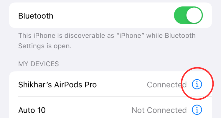 Screenshot of the Bluetooth devices menu highlighting the more info icon next to AirPods name.