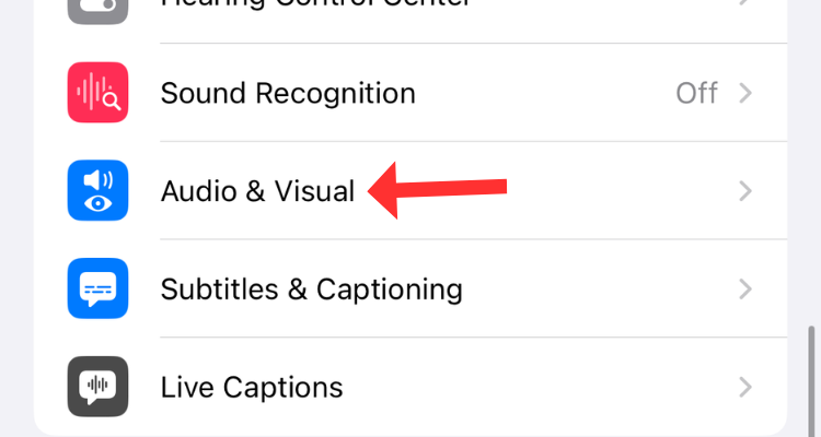 Screenshot of the iPhone's Accessibility menu with an arrow next to Audio & Visual option.