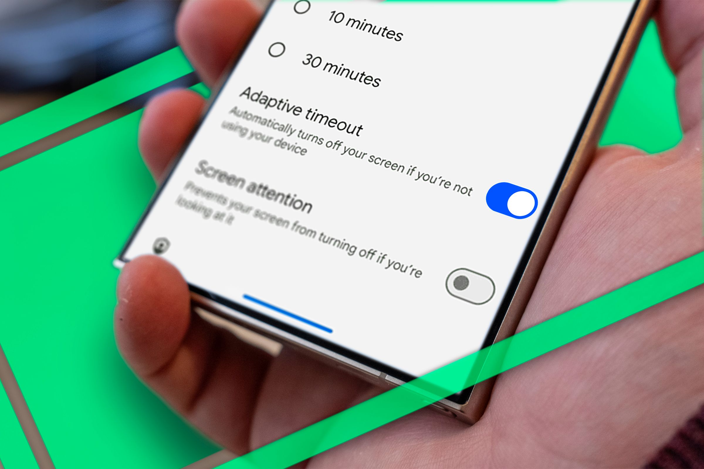 A hand holding a phone showing the adaptive timeout feature.