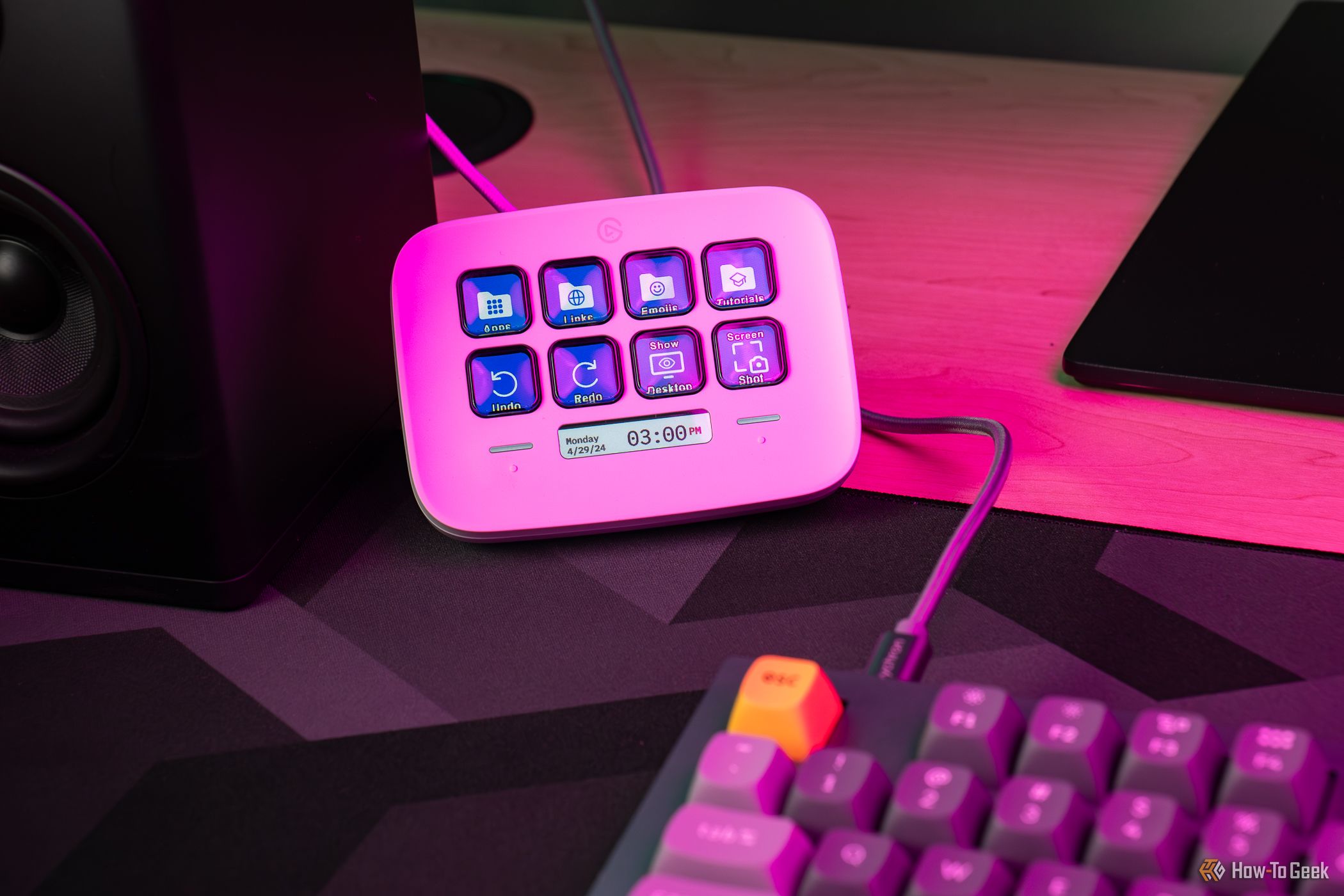 Elgato Stream Deck Neo on a desk