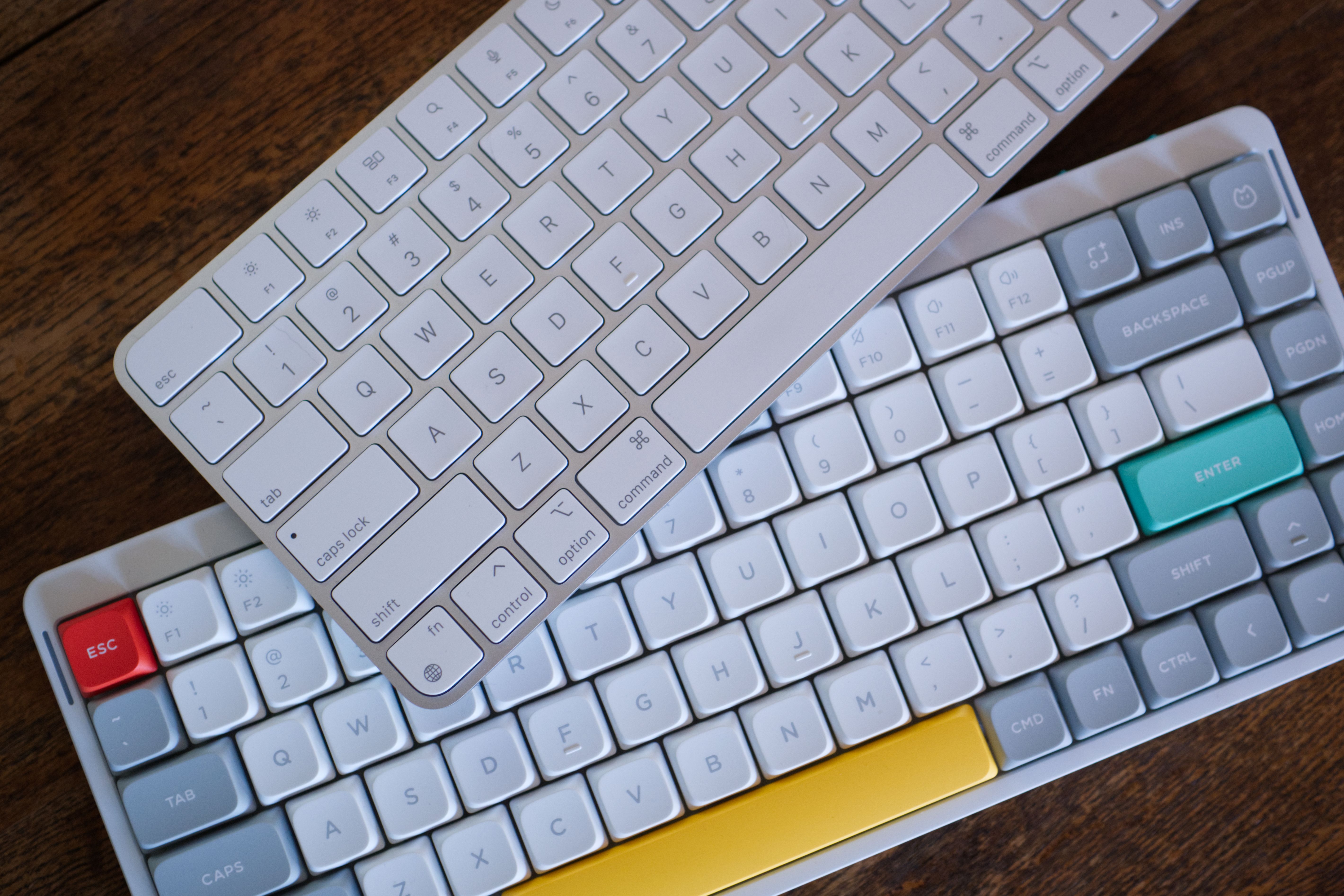 Apple Magic Keyboard stacked on top of a NuPhy Air75 V2.