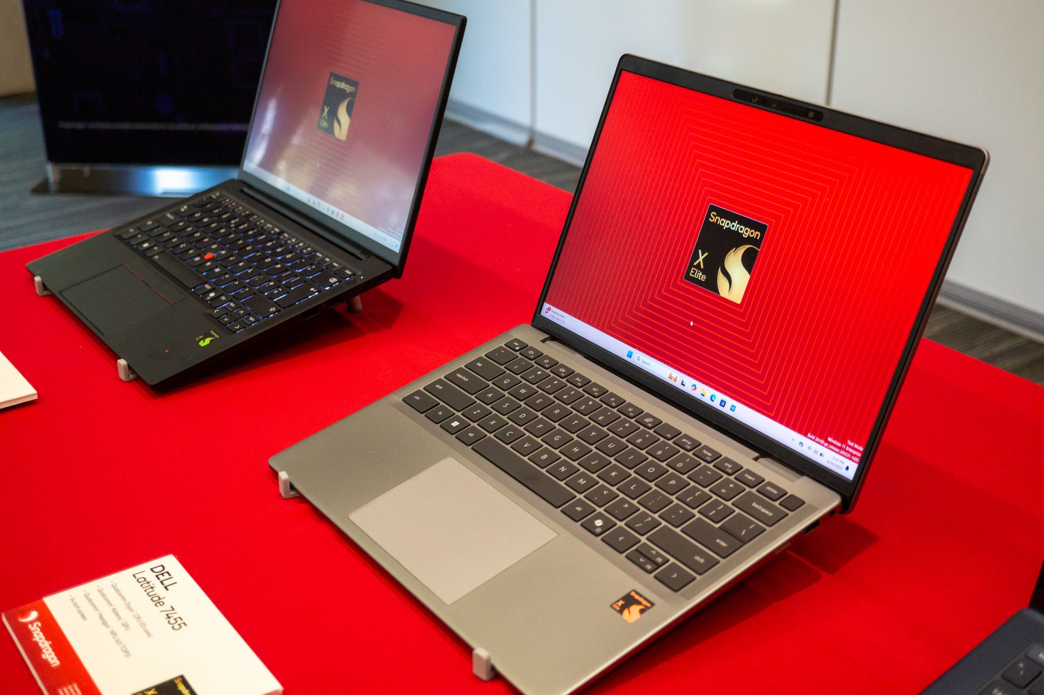 Two Snapdragon X Elite laptops on a table.