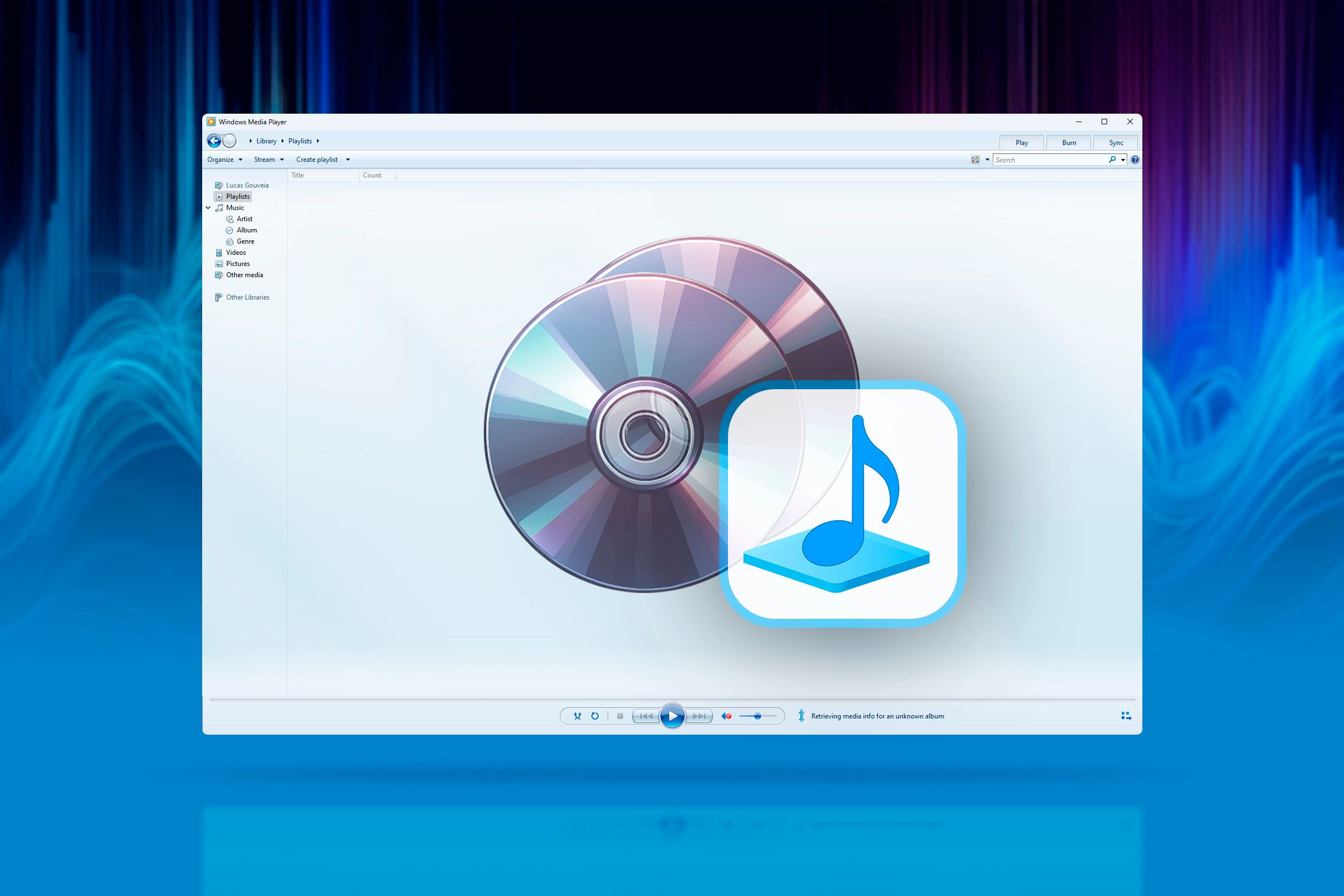 Windows Media Player window with a CD and music icon in the center.