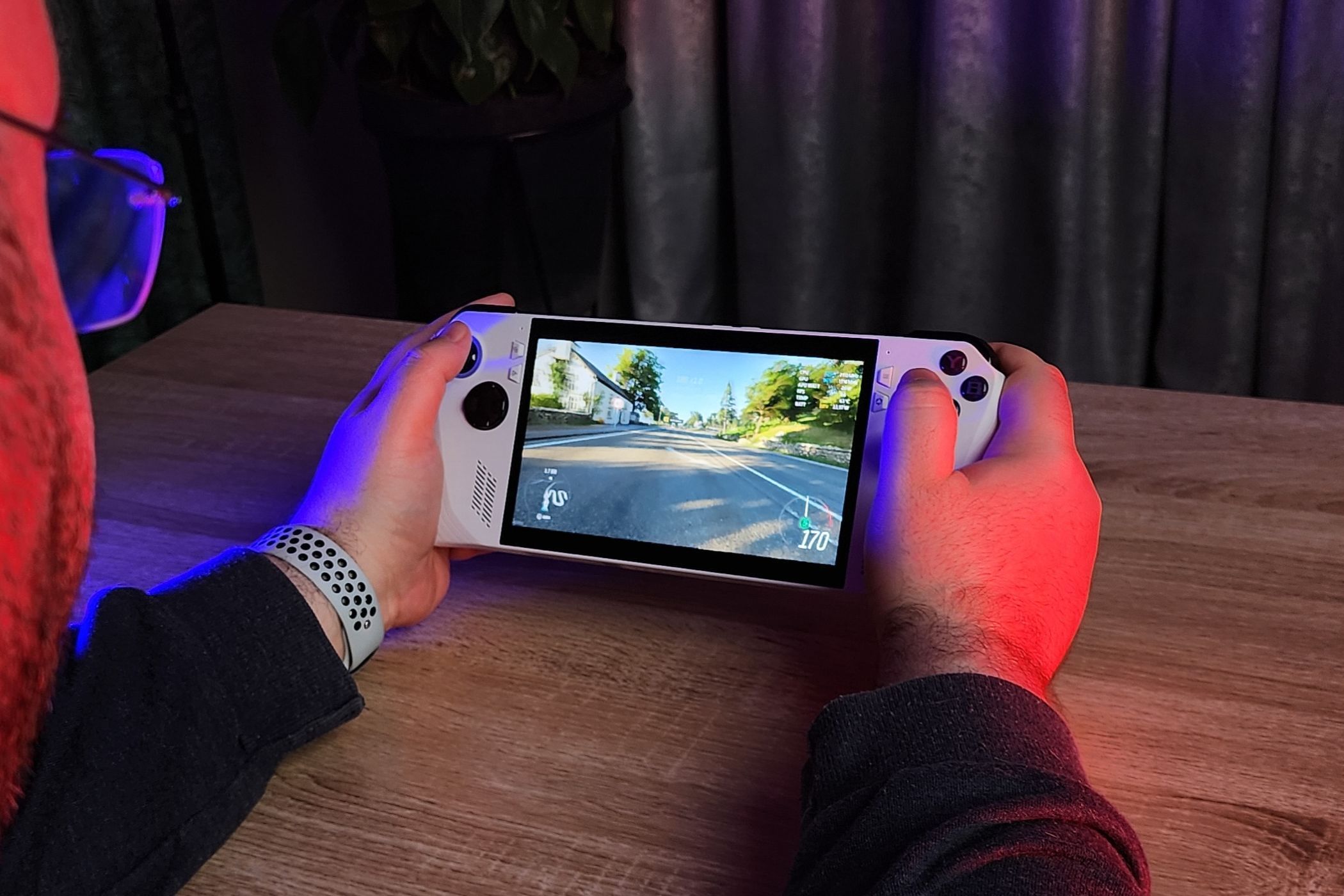 Author holding ROG Ally playing Forza Horizon 4