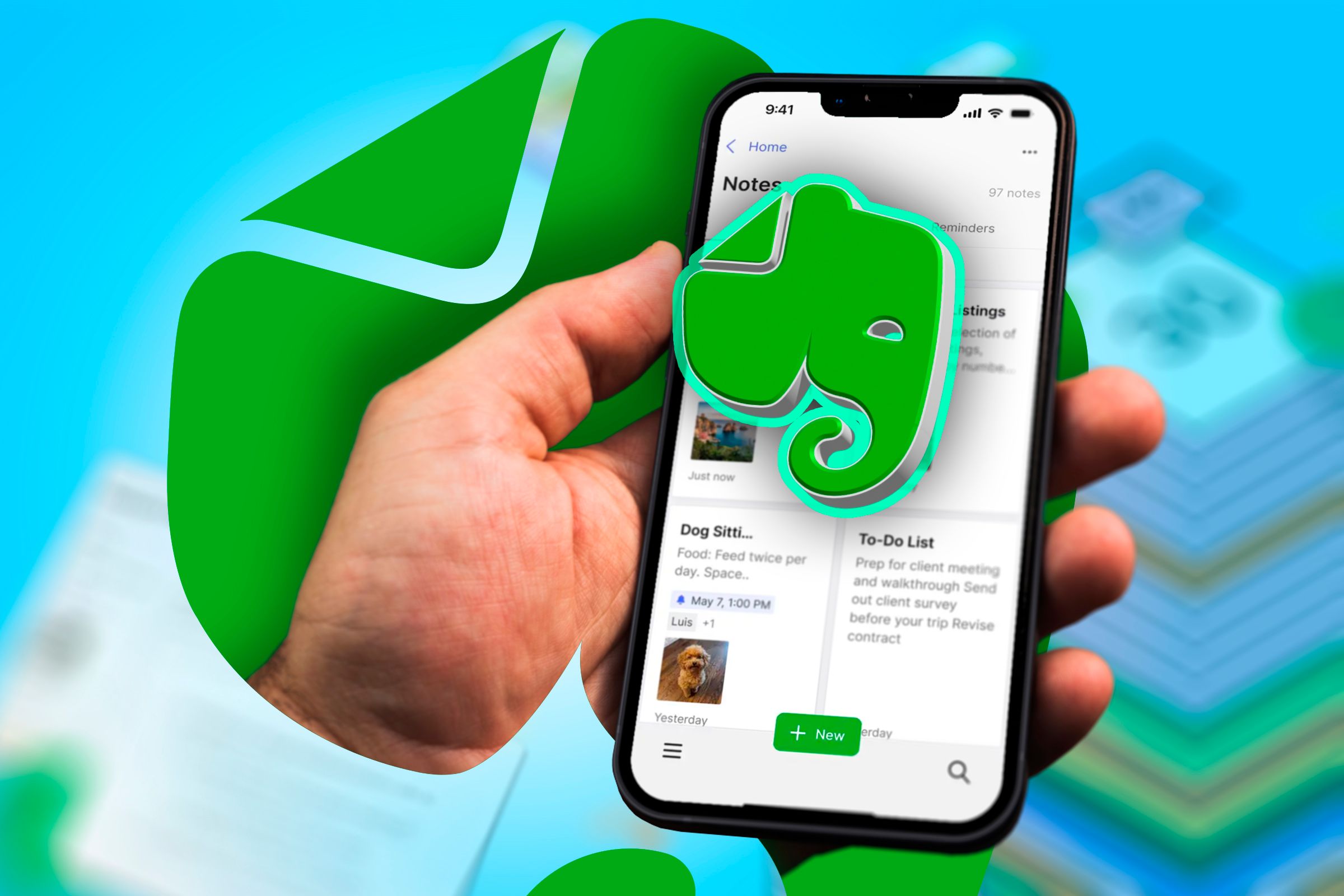 A hand holding a phone with Evernote logo.