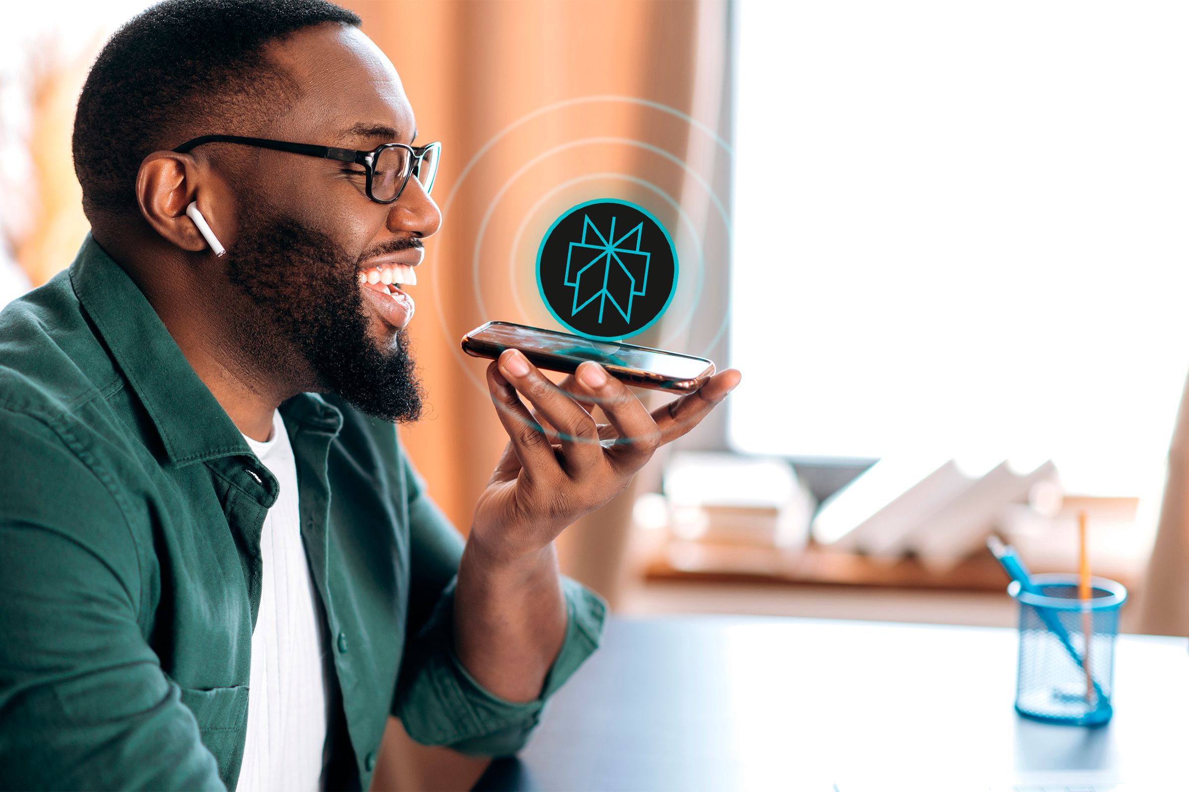 A man speaking to a phone with Perplexity's logo above the screen.