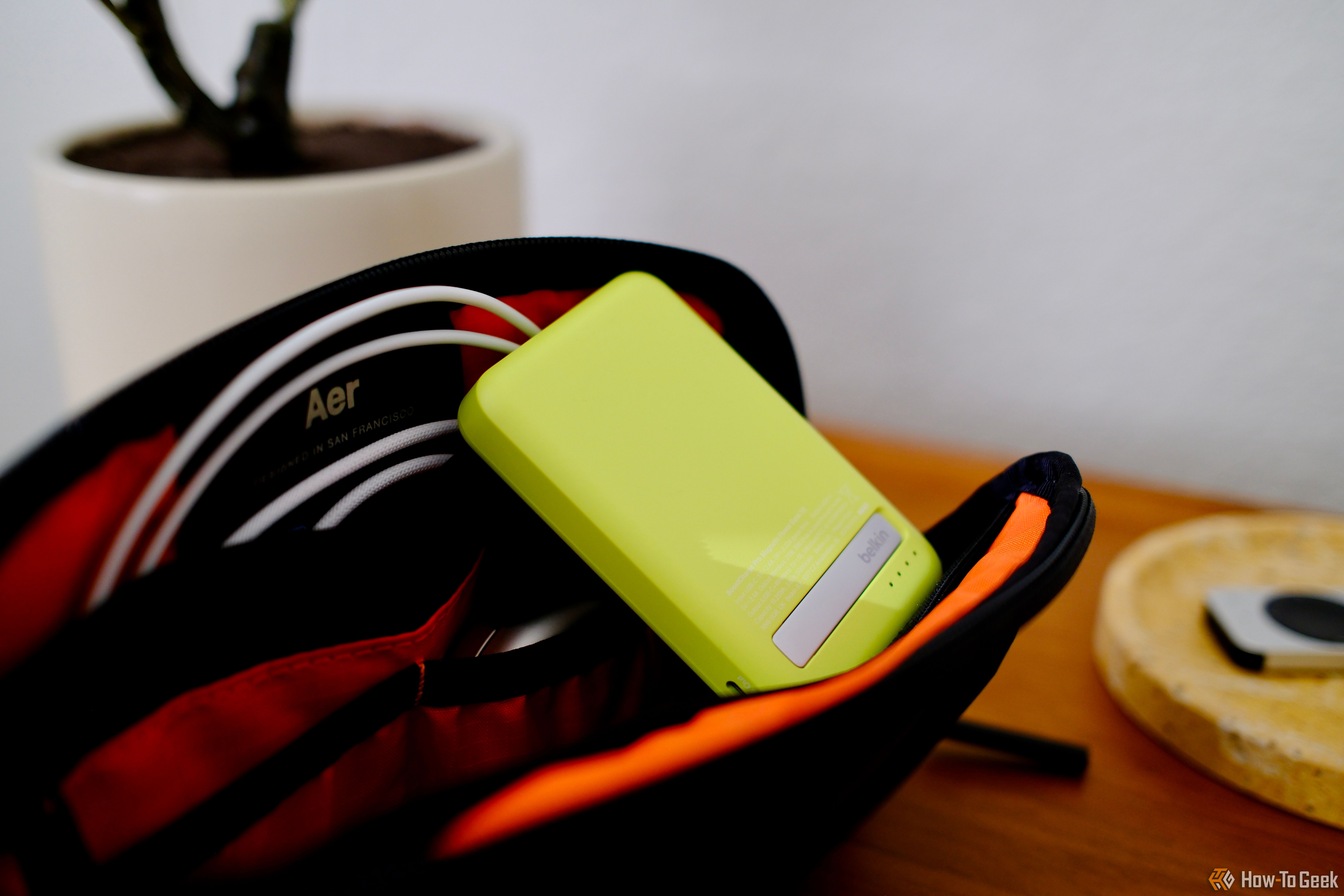 Belkin BoostCharge Pro Power Bank 5K laying in a small bag