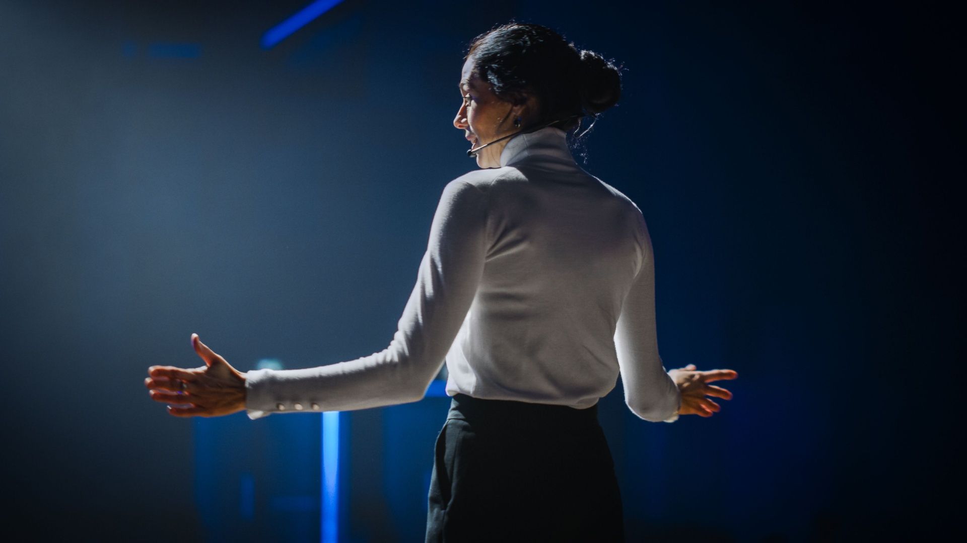 Female Motivational Speaker on Stage