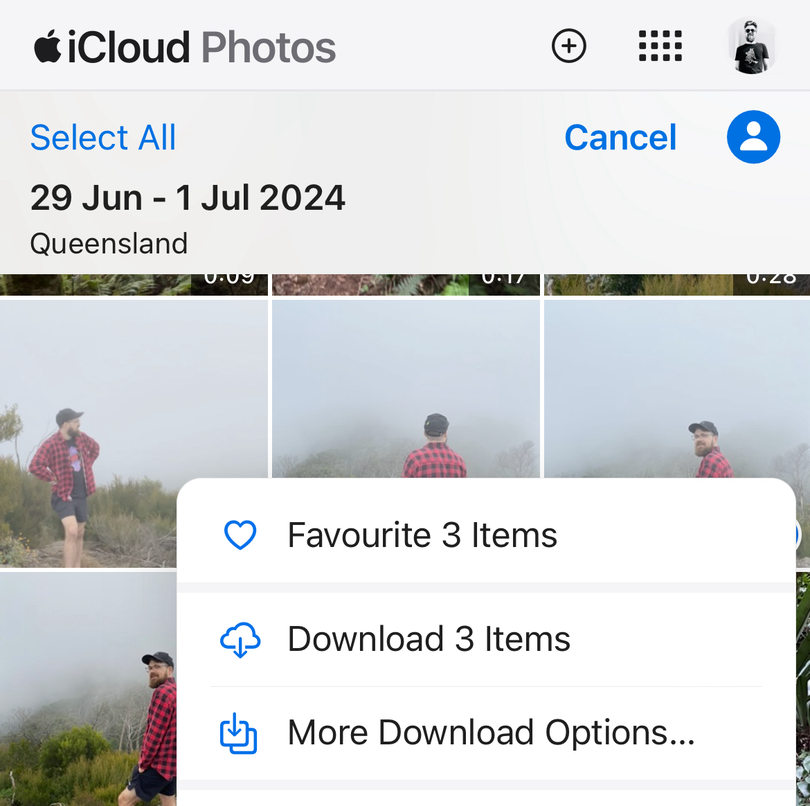 Downloading iCloud Photos using a mobile browser.