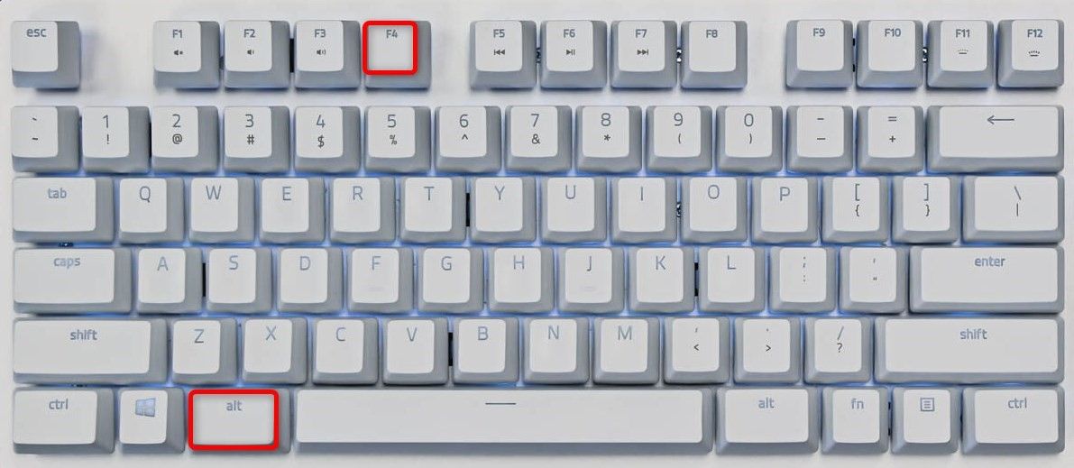 Alt+F4 highlighted on a Windows keyboard.