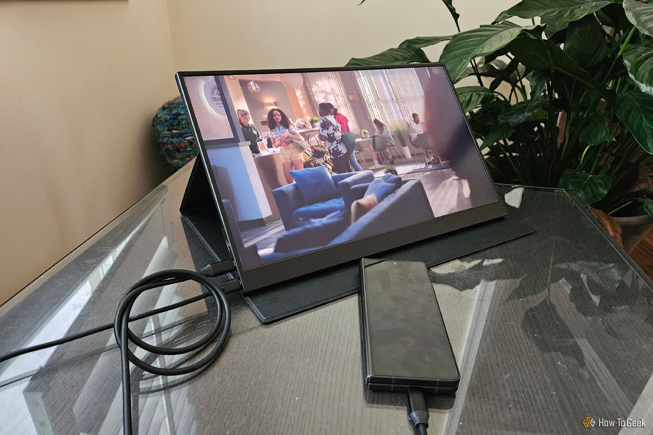 Galaxy Z Fold 5 connected to a portable monitor via a USB-C cable.