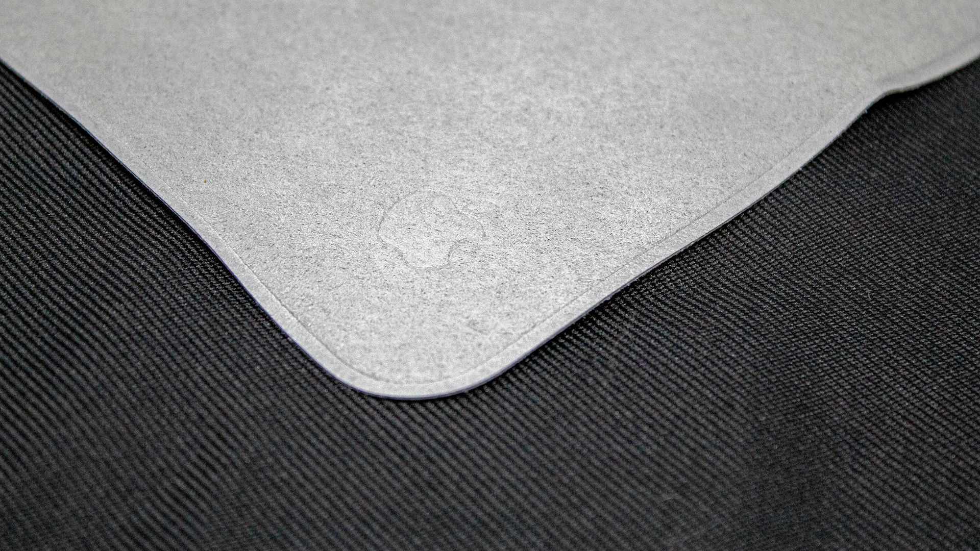 A closeup of the cloth showing an Apple logo