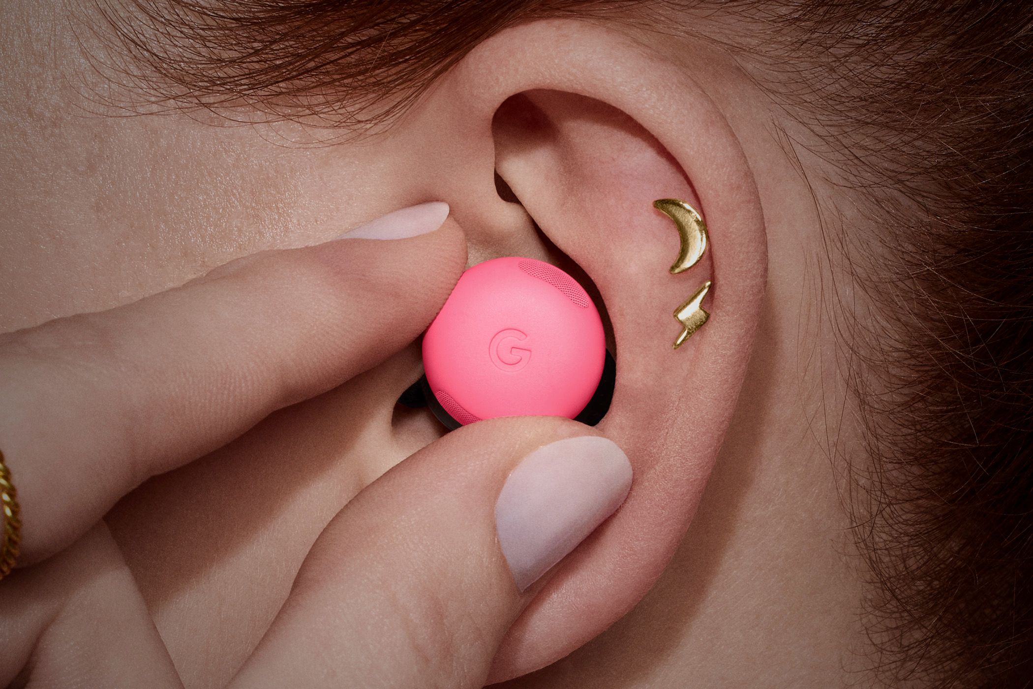 The Google Pixel Buds Pro 2 in someone's ear.