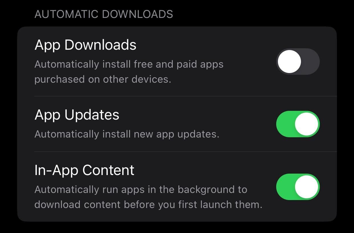 Enabling automatic app updates settings on iPhone.