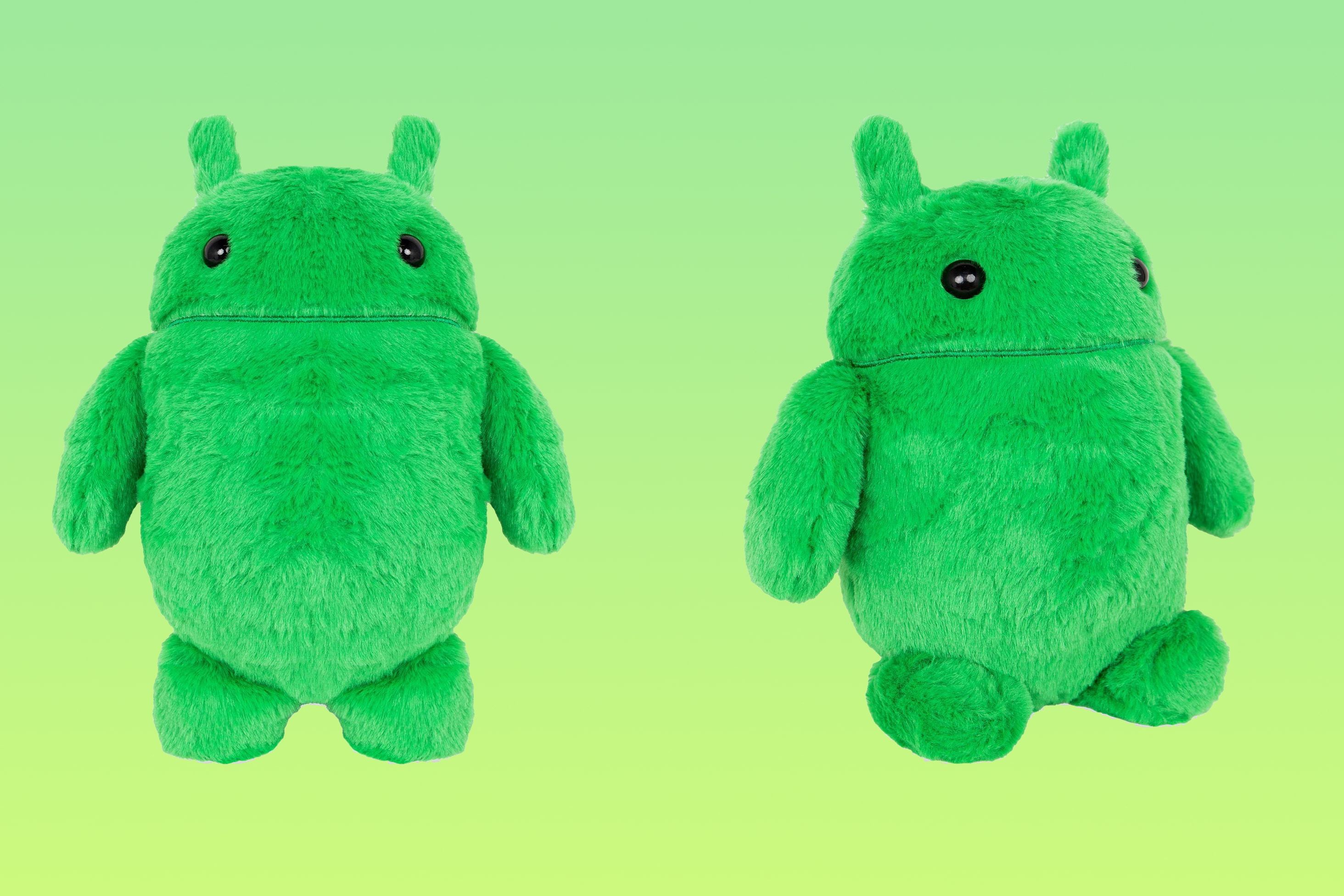 Two Android plush toy, set against a green color gradient background.