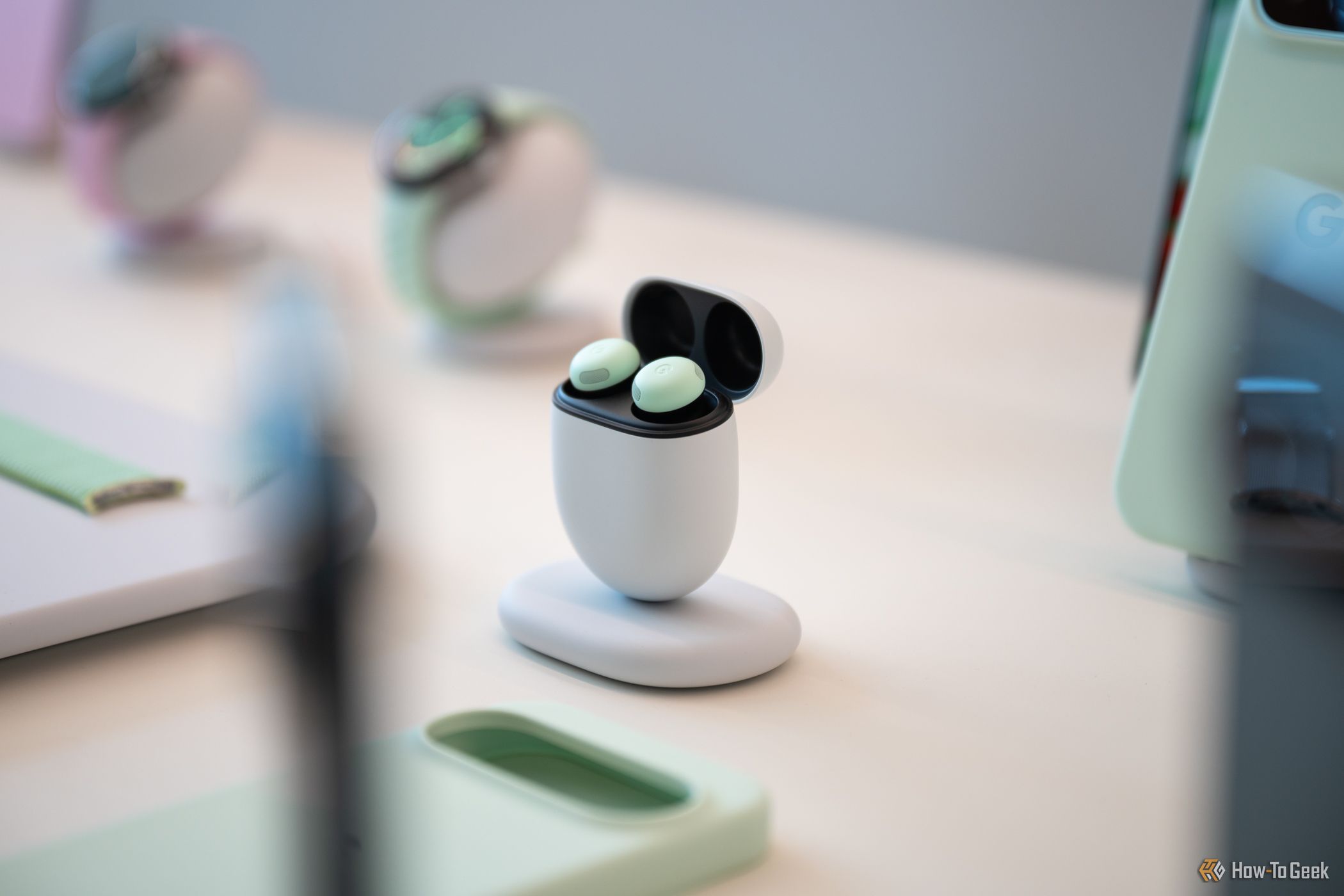 Google Pixel Buds Pro 2 in Wintergreen sitting on display