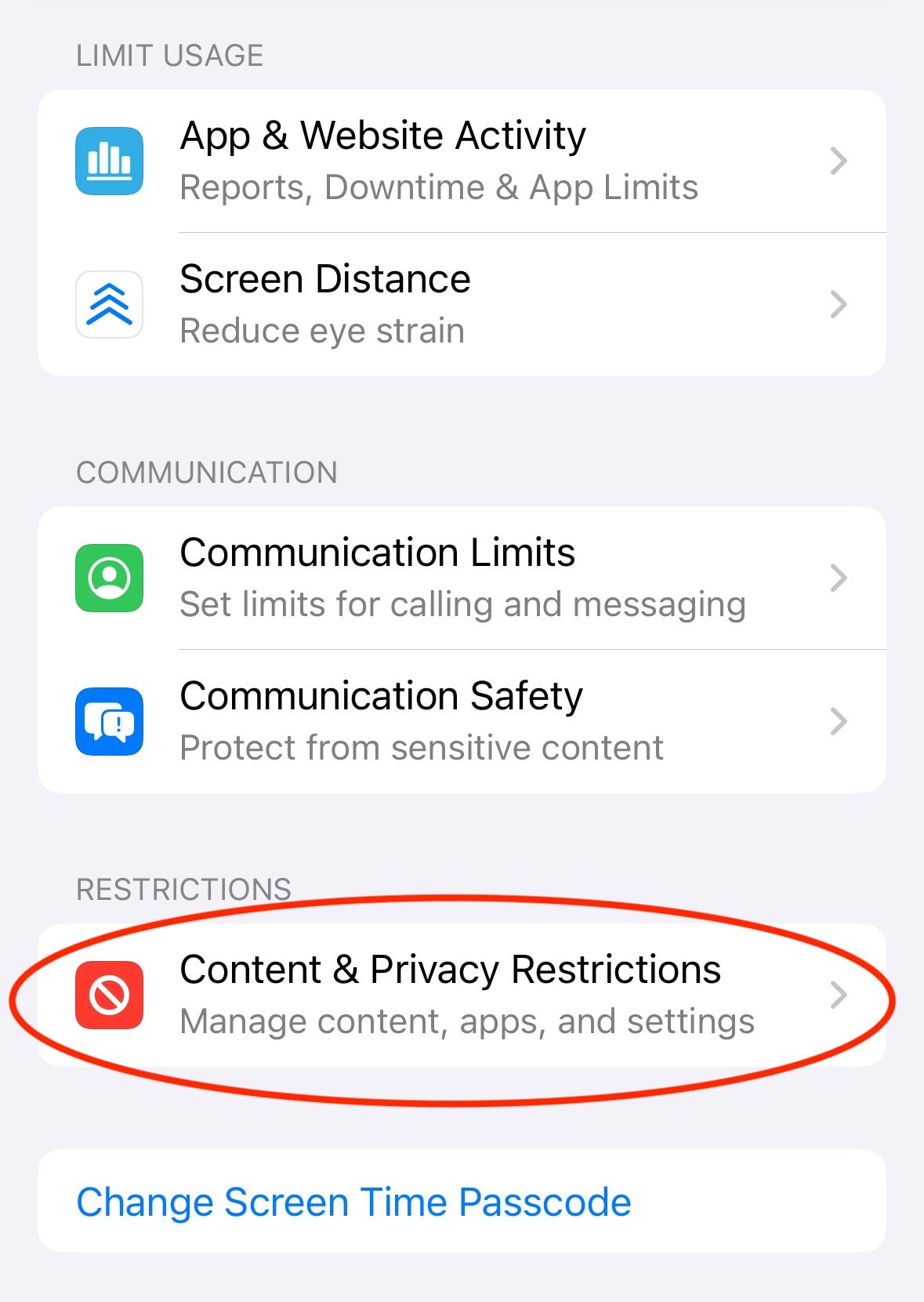 Screen Time settings in iPhone with Content & Privacy Restrictions circled.