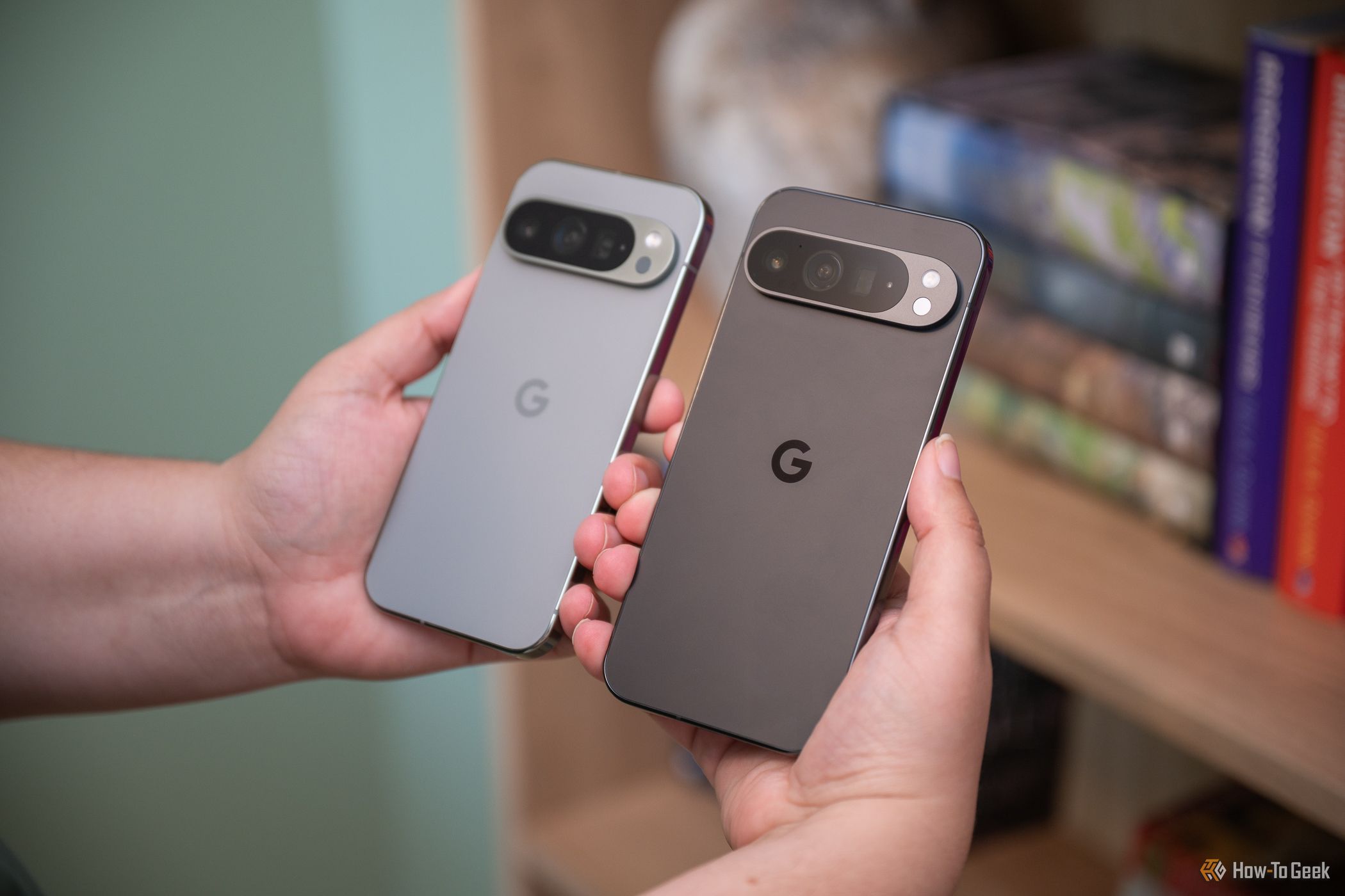 Person holding the Google Pixel 9 Pro and 9 Pro XL-1