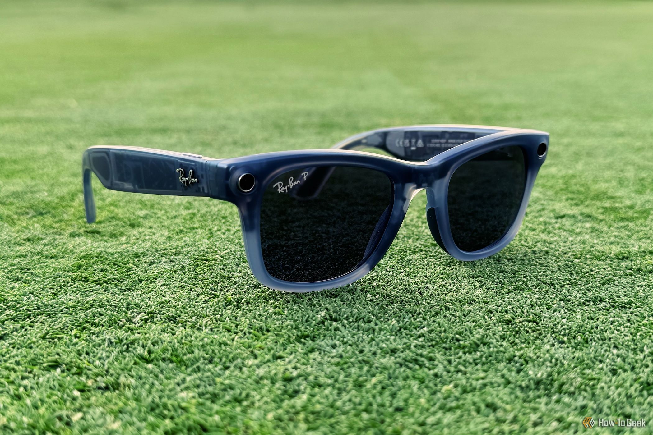 Ray-Ban Meta Smart Glasses sitting on grass