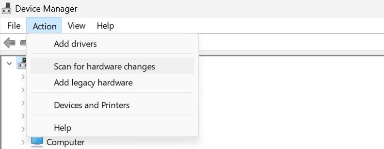 Scanning for hardware changes in Device Manager.