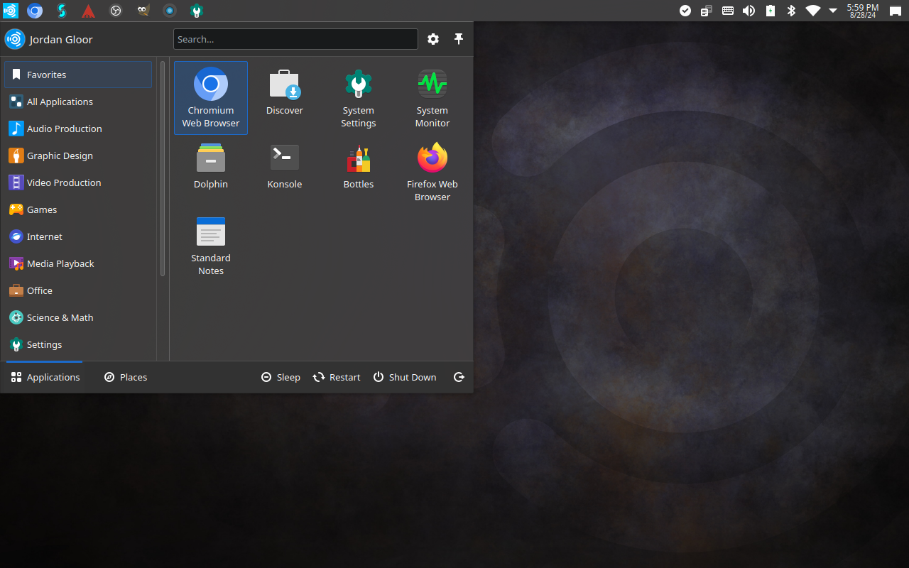 The Ubuntu Studio desktop with application launcher open showing various apps.