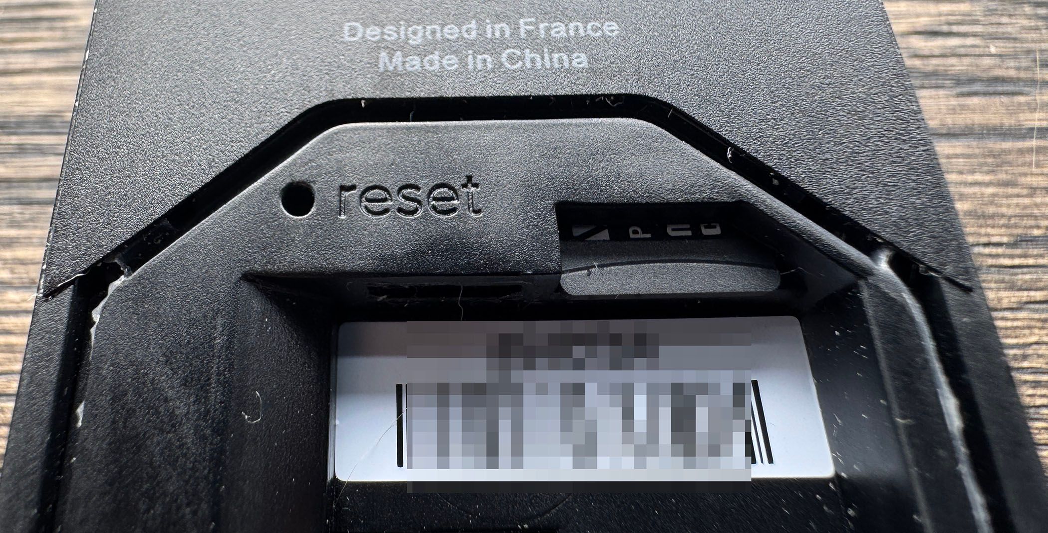 The recesssed reset switch for a doorbell camera.