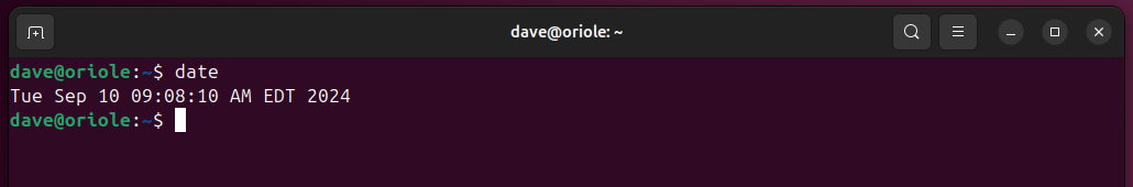 Using the date command in a terminal window, with no format specifiers.