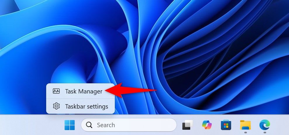 'Task Manager' highlighted in the taskbar context menu.