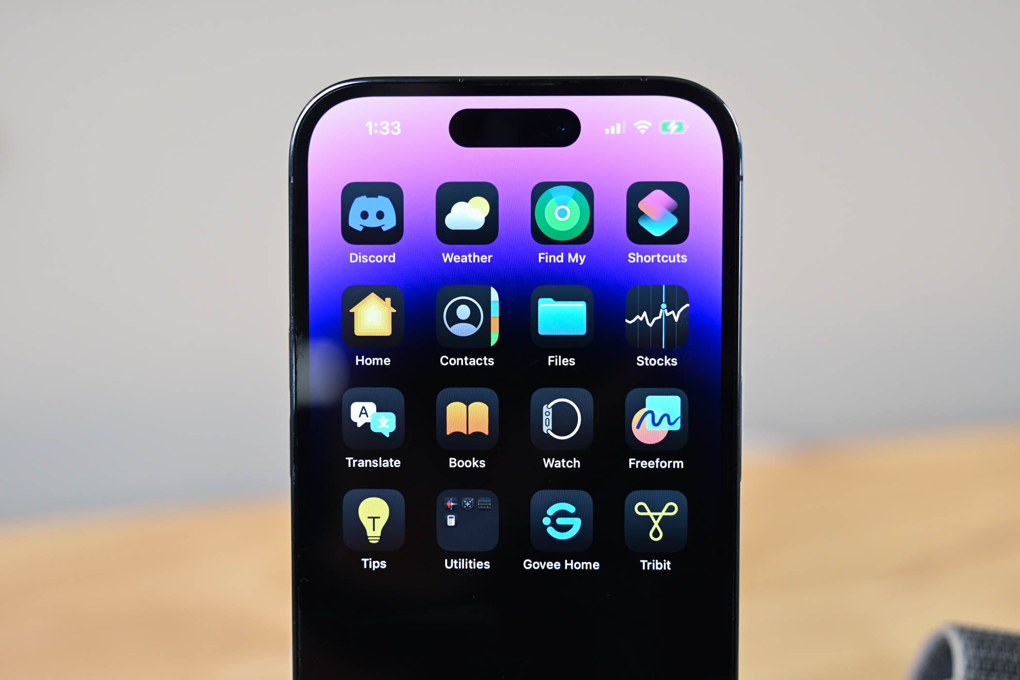 Dark Mode icons on the iPhone home screen.