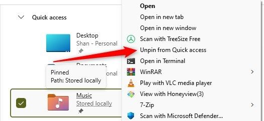 Unpinning a folder from quick access in File Explorer.