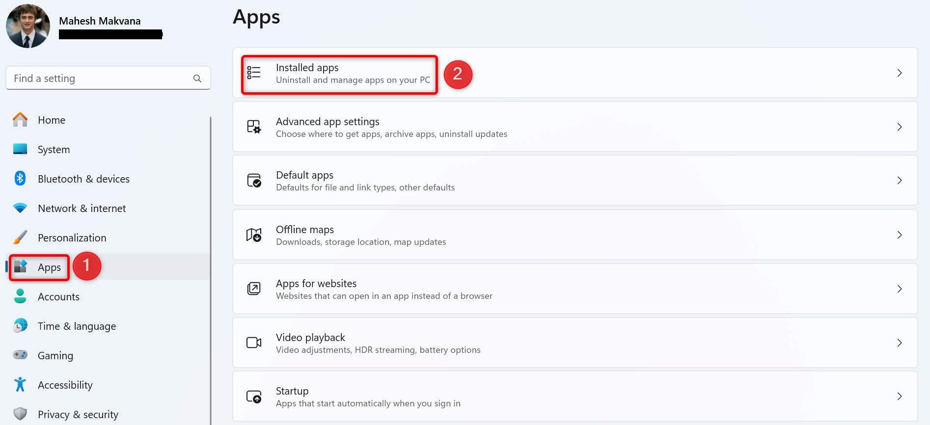 'Apps' and 'Installed Apps' highlighted in Windows 11 Settings.