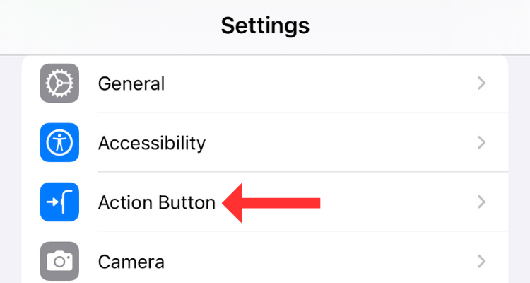 Screengrab of the iPhone Settings app with an arrow next to the Action Button option.