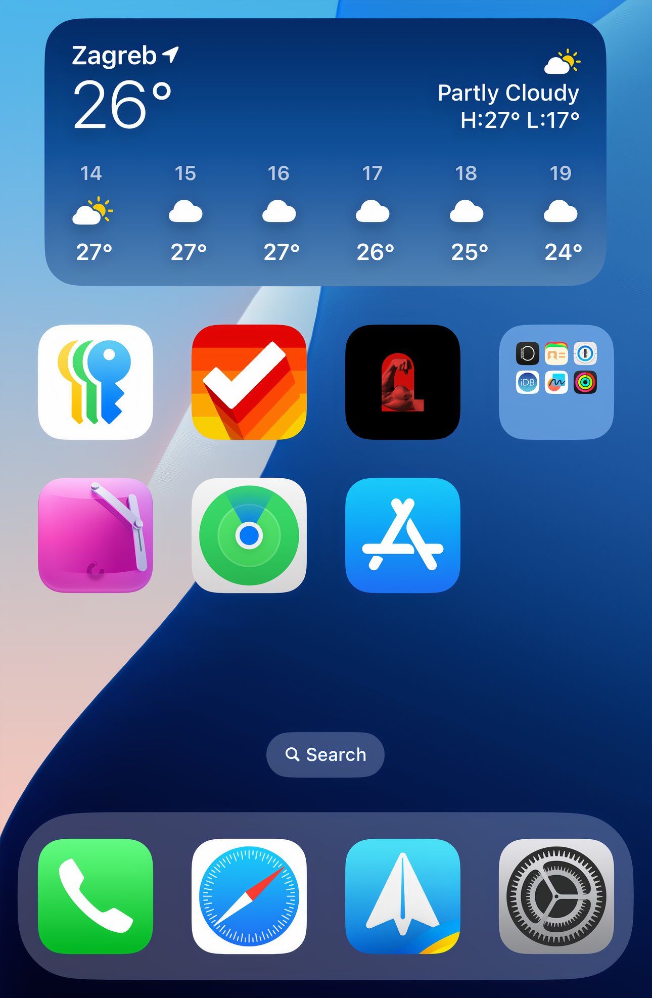 The iPhone's Home Screen in large icon mode without icon labels.