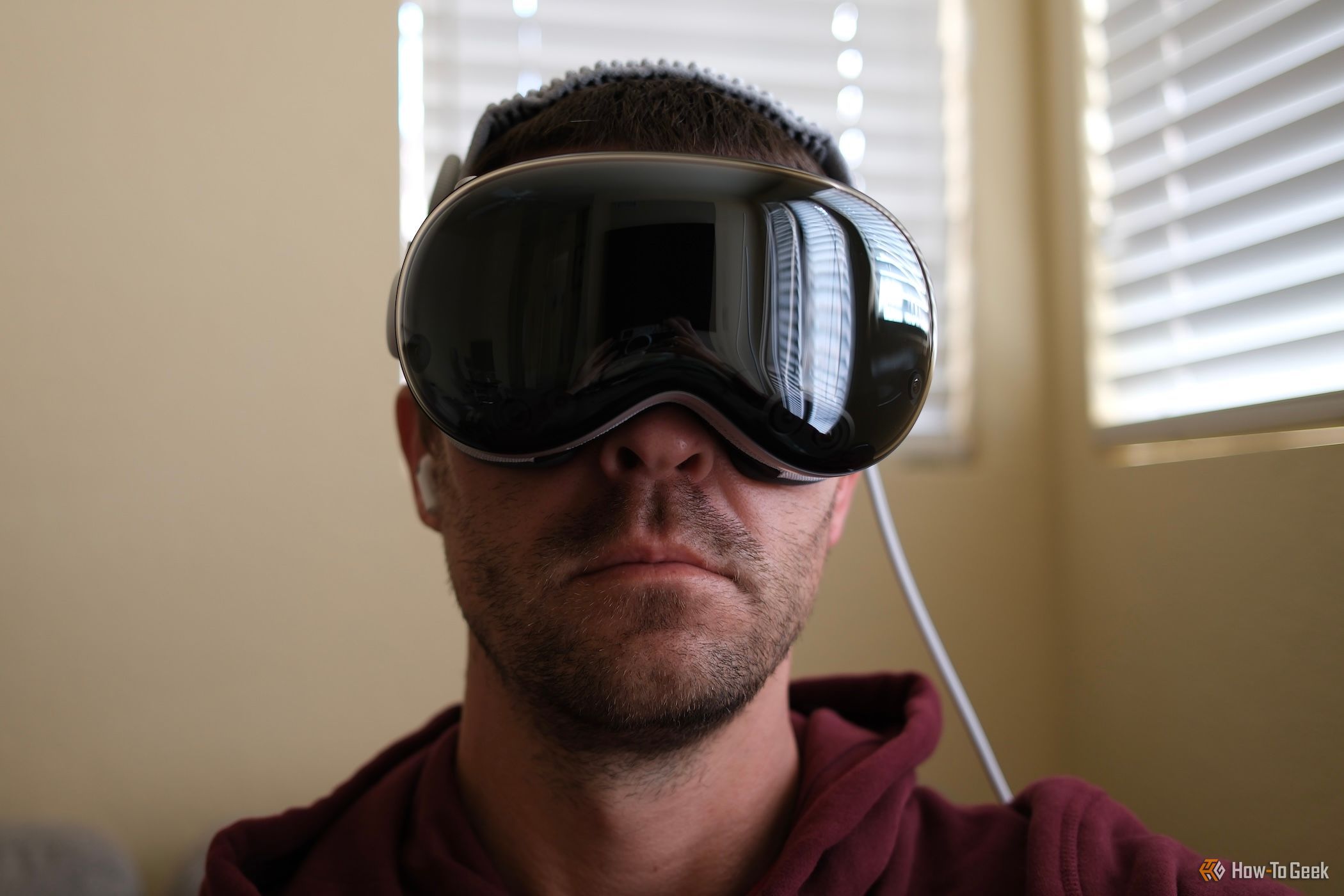 Front view of a person wearing Apple Vision Pro.