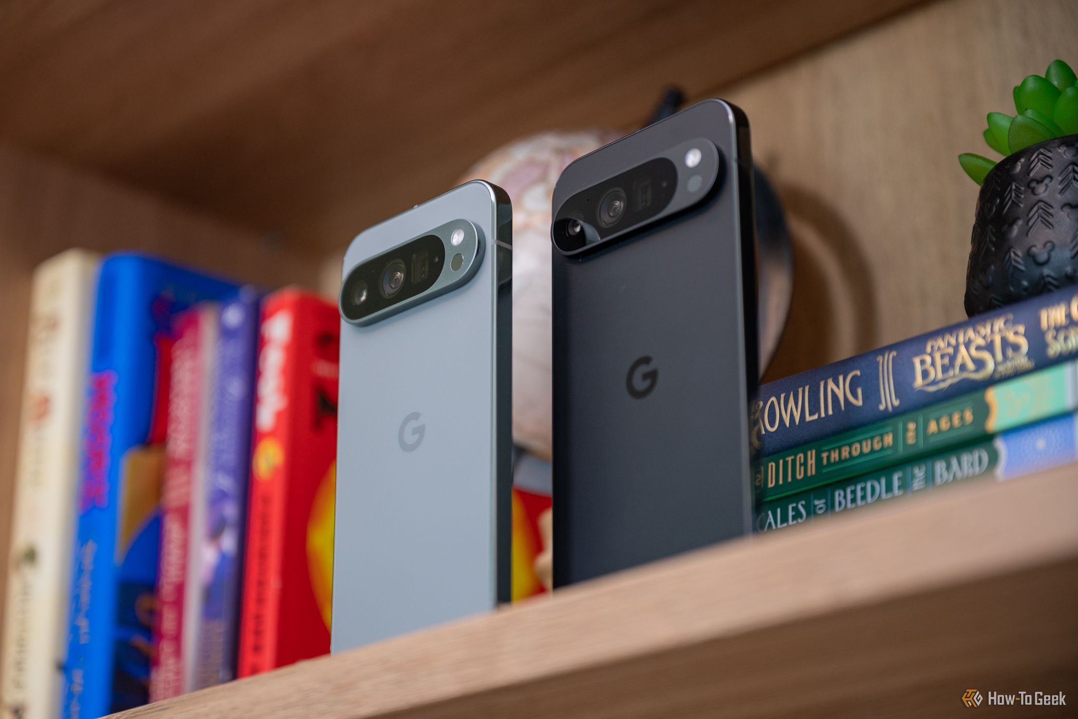 Google Pixel 9 Pro and 9 Pro XL cameras standing on a shelf-1