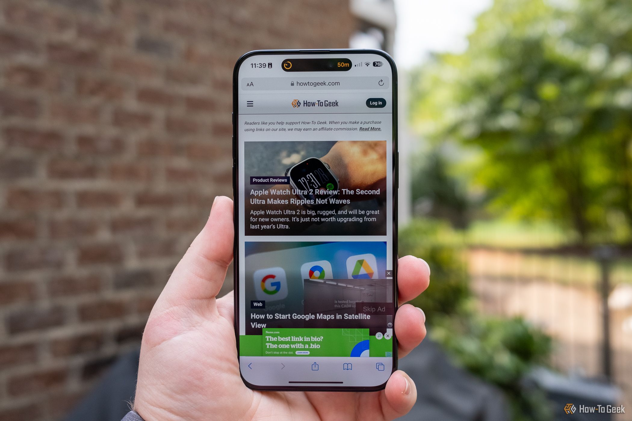 How-To Geek webpage running on the Apple iPhone 15 Pro Max.