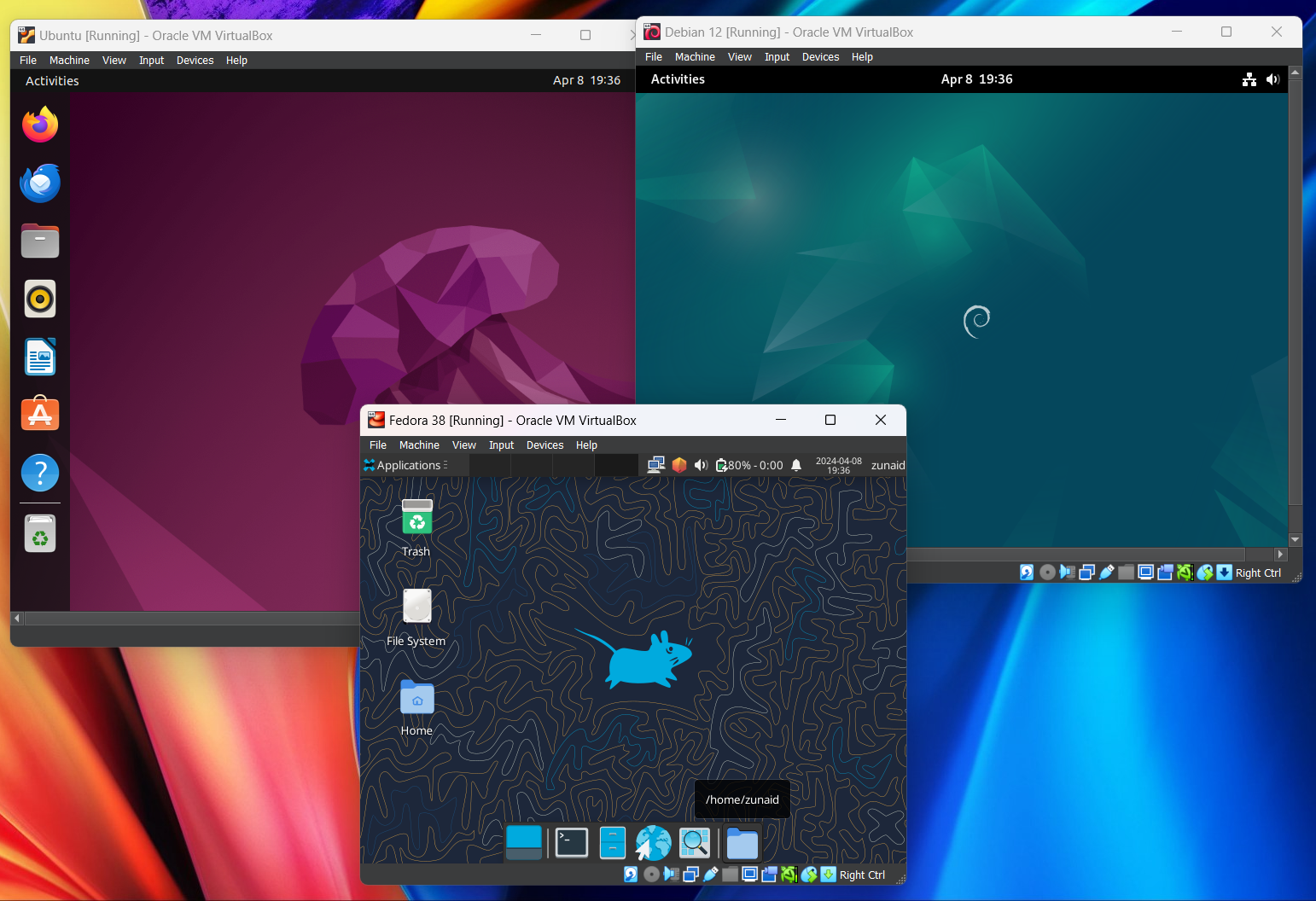 An example of Ubuntu, Debian, and Fedora Linux distributions running on the same device using VirtualBox.