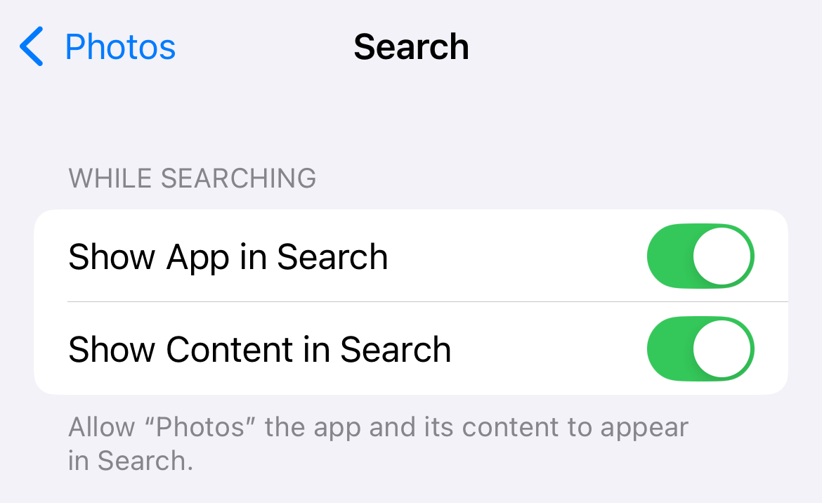 Options for hiding the Photos app and its contents from Spotlight search.