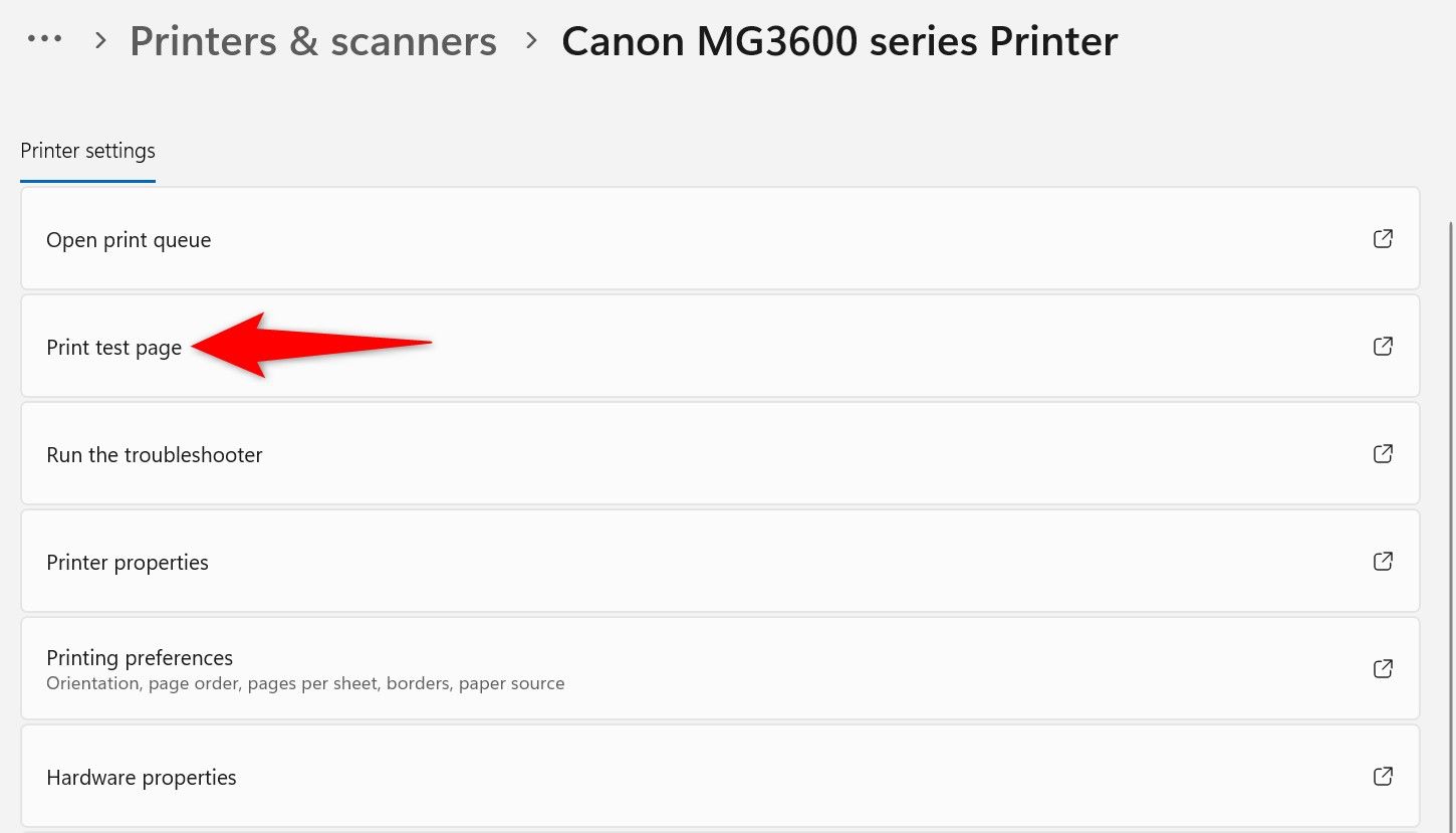 'Print Test Page' highlighted in Windows 11 Settings.