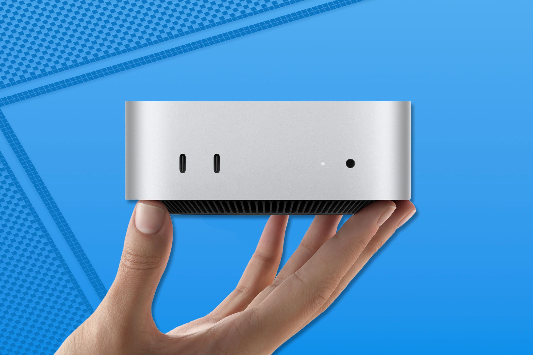 The M4 Mac Mini on a blue background.