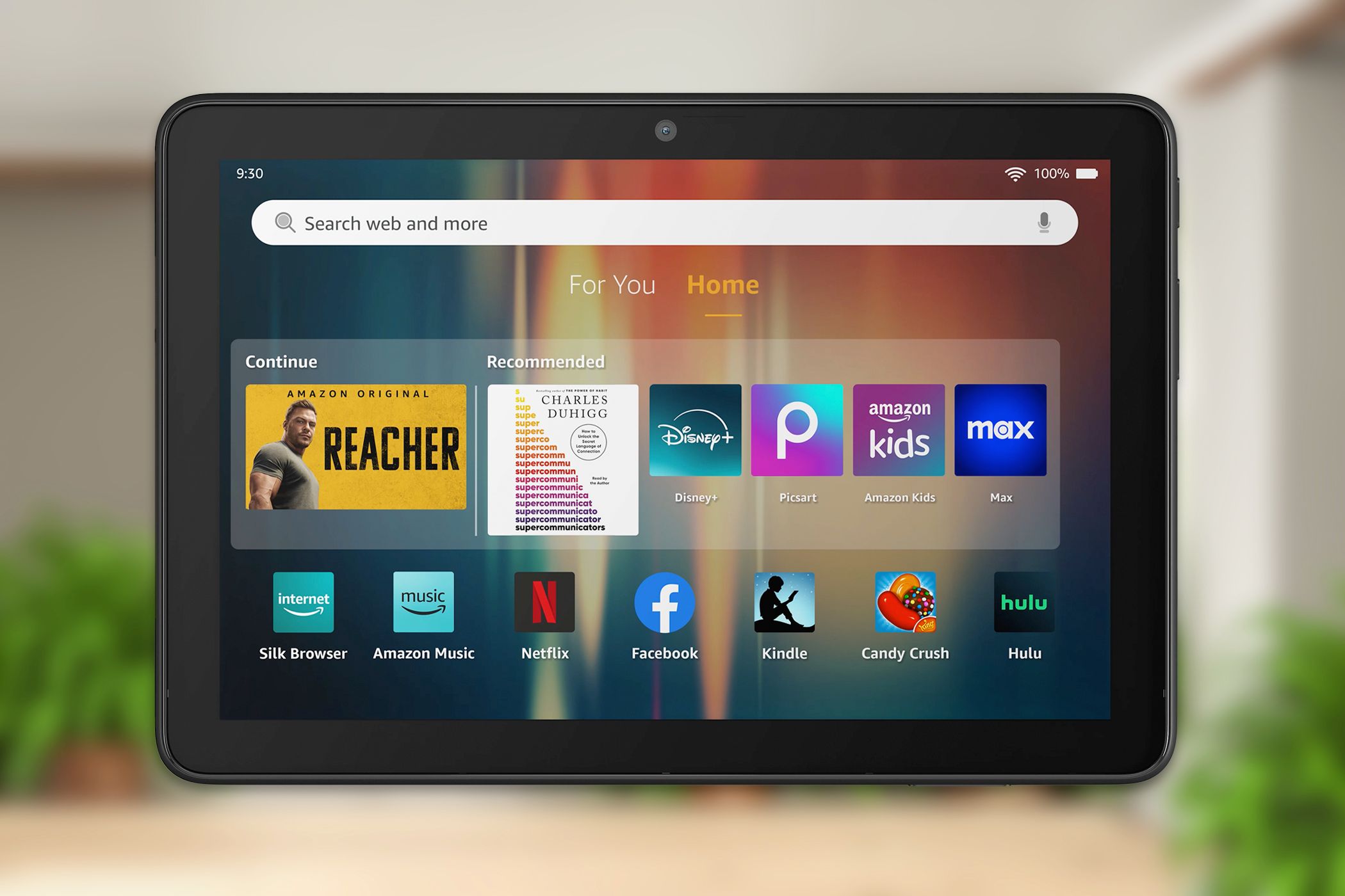 The 2024 Fire HD 8 Tablet over a colorful background.