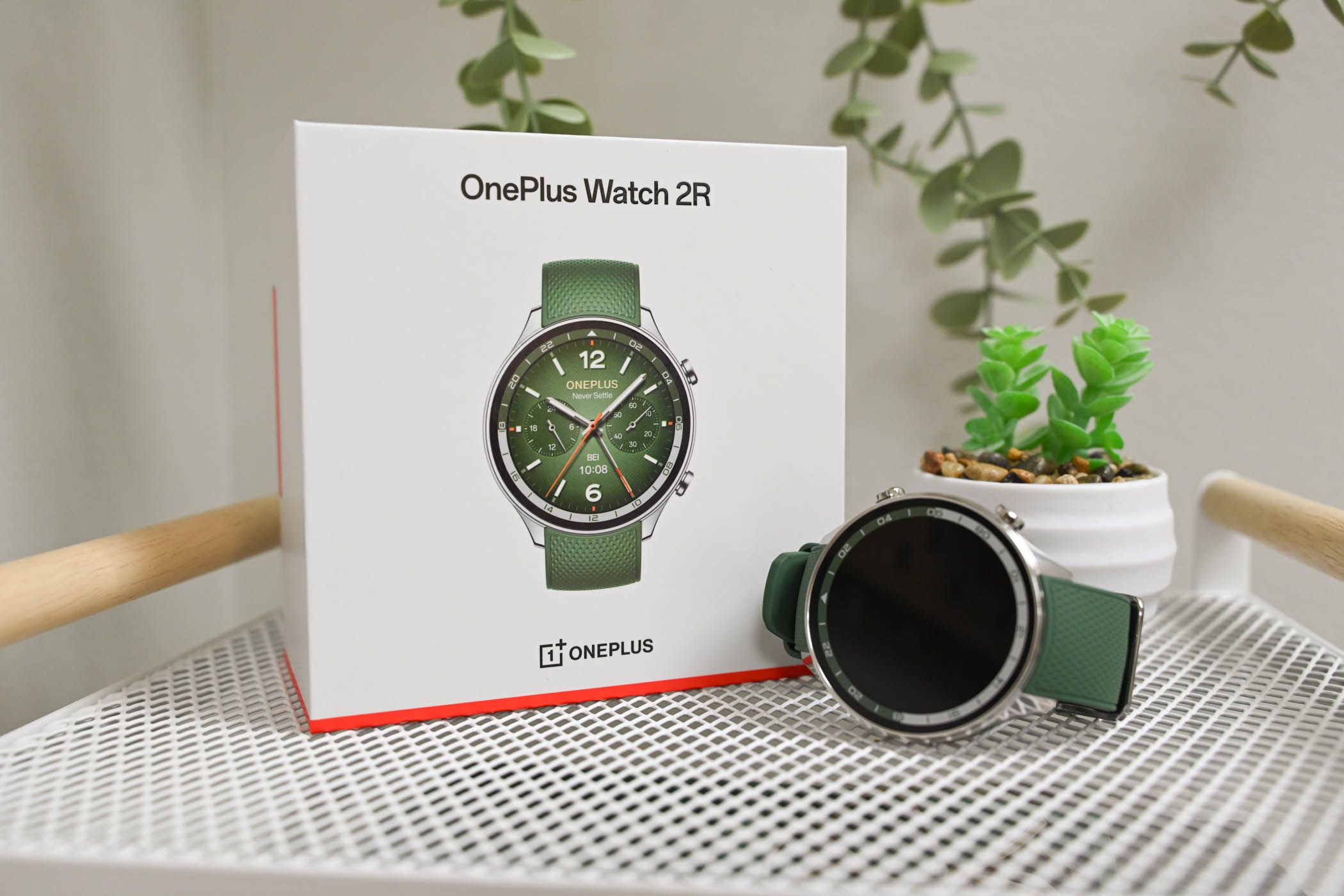 The OnePlus Watch 2R with its box