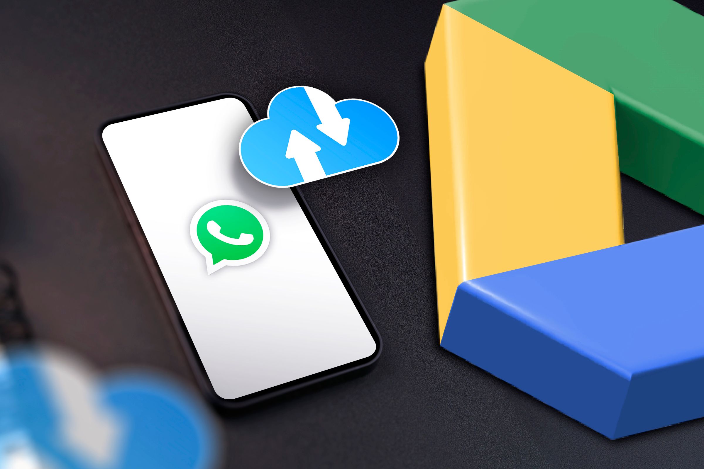 A phone with the WhatsApp logo, a backup icon above the screen, and the Google Drive logo next to it.